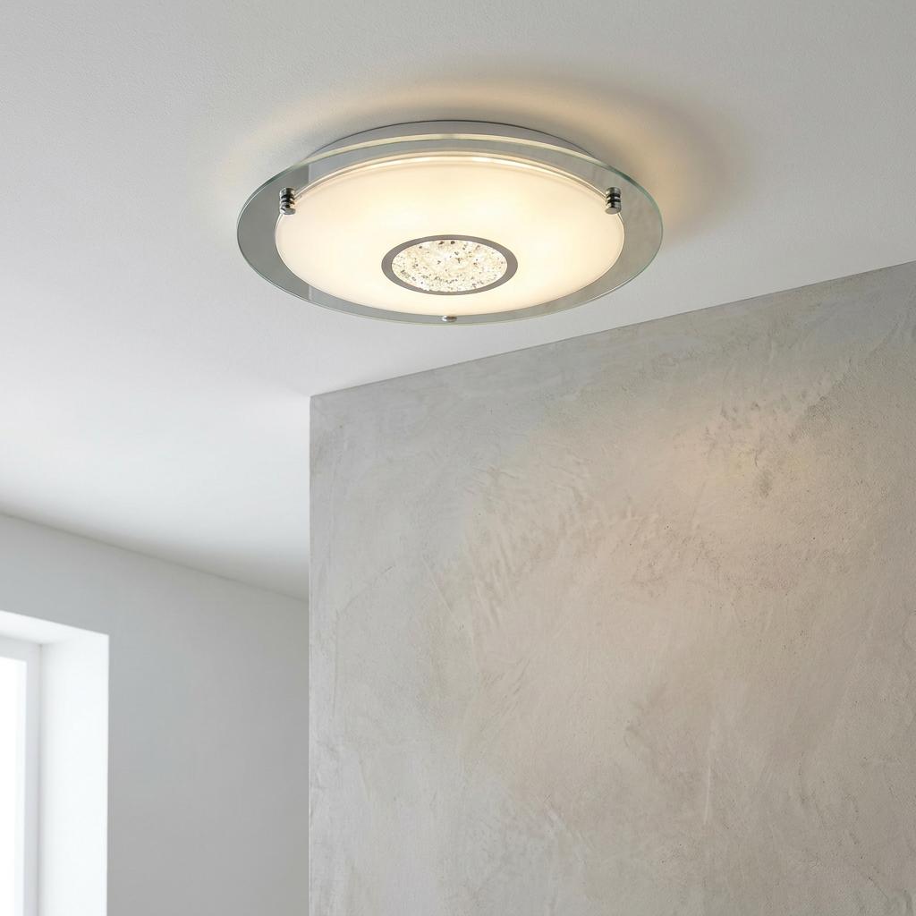 Searchlight Portland IP44 LED Flush ceiling light with chrome trim and crystal detail on a white ceiling.