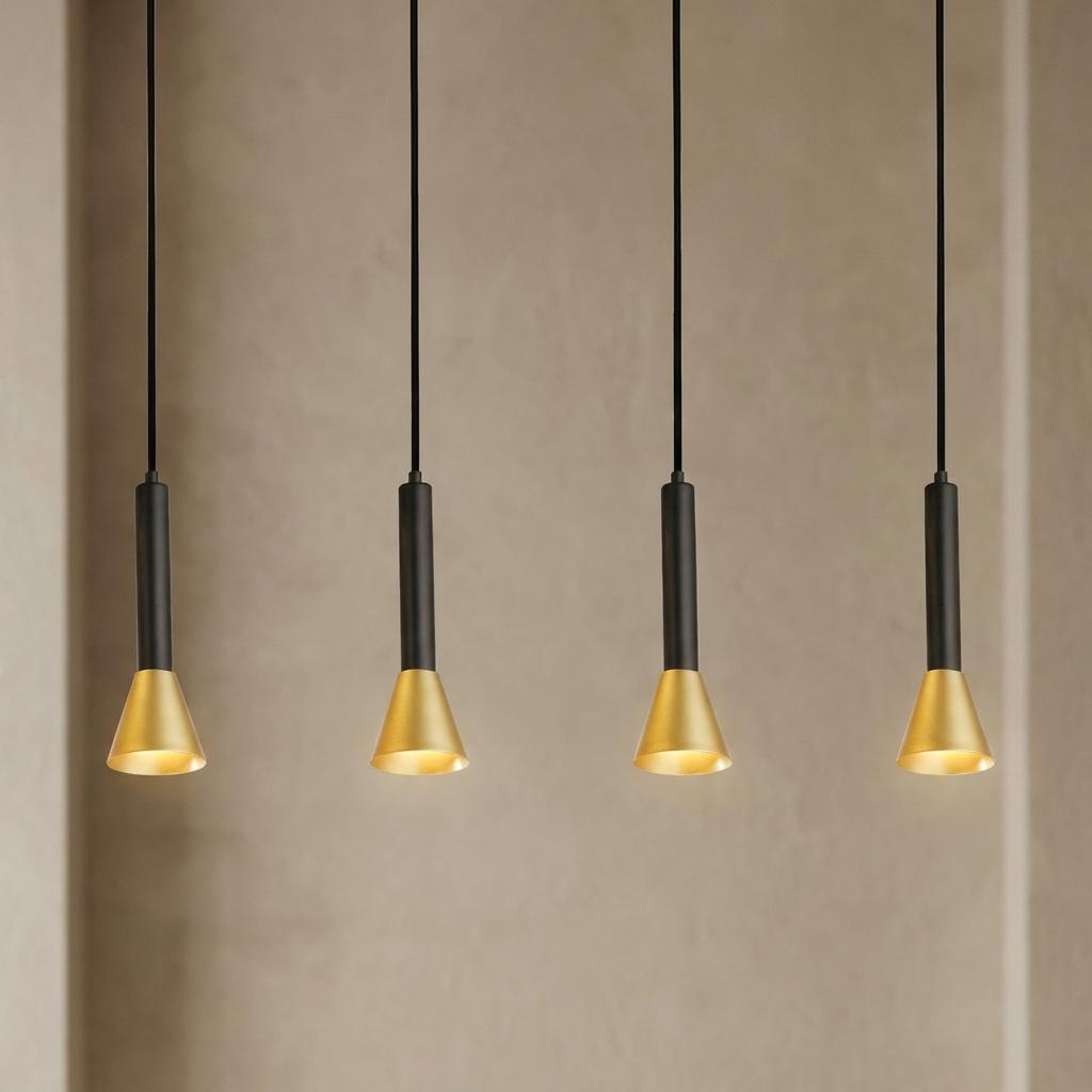 Four modern pendant lights with black cylindrical stems and gold conical shades against a neutral background.