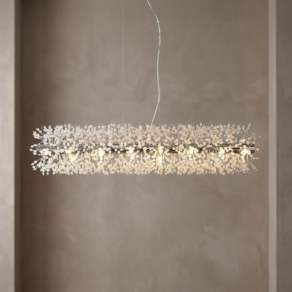 Modern 16-light chrome bar pendant featuring intricate glass bead clusters, hanging against a neutral wall.