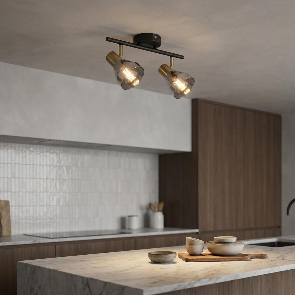 Searchlight Westminster 2-light black and brass spotlight with smoked glass shades on a kitchen ceiling.