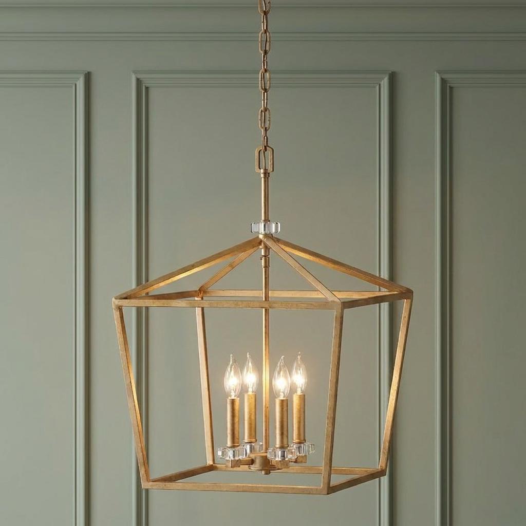Brass lantern pendant light with four candle bulbs hanging against a green paneled wall.