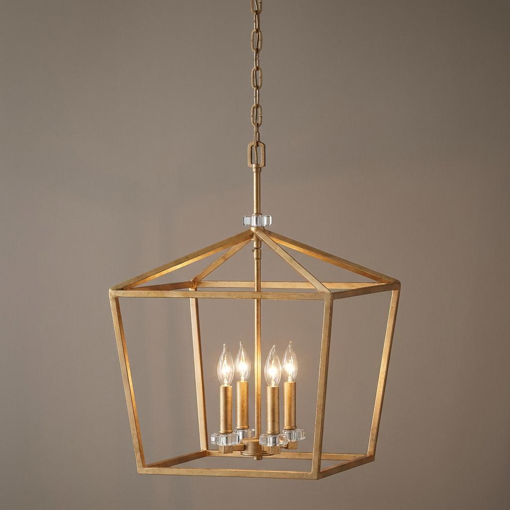 A four-light brass lantern pendant with crystal accents and candle-style bulbs hanging against a neutral wall.