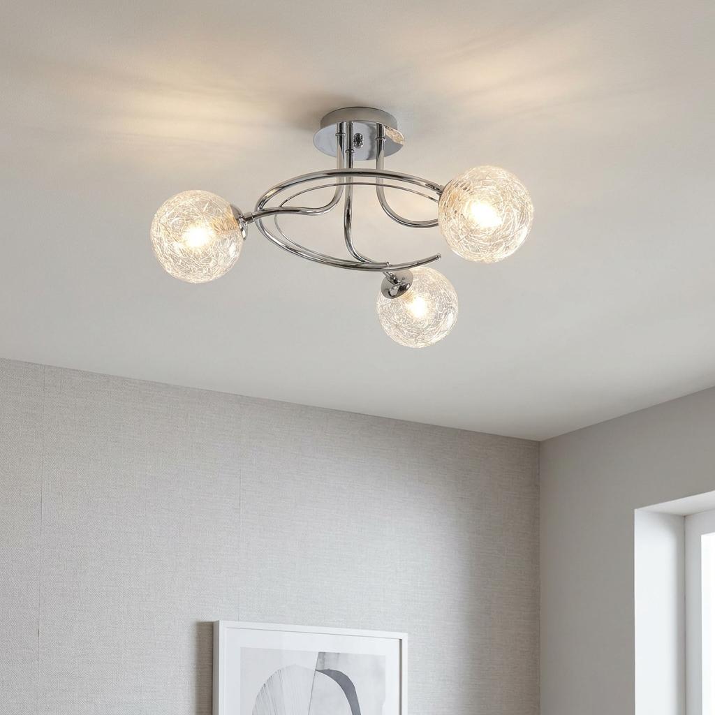 Modern Tabia 3-light chrome flush ceiling light with glowing textured glass globes on a white ceiling.