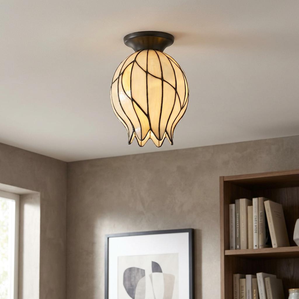 Tulip-shaped Tiffany flush ceiling light with cream glass panels and dark leaded lines in a modern living space.