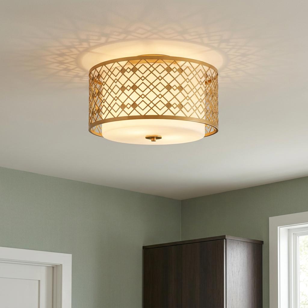 Ziggy gold lattice flush ceiling light casting geometric shadows on a white ceiling in a green-walled room.