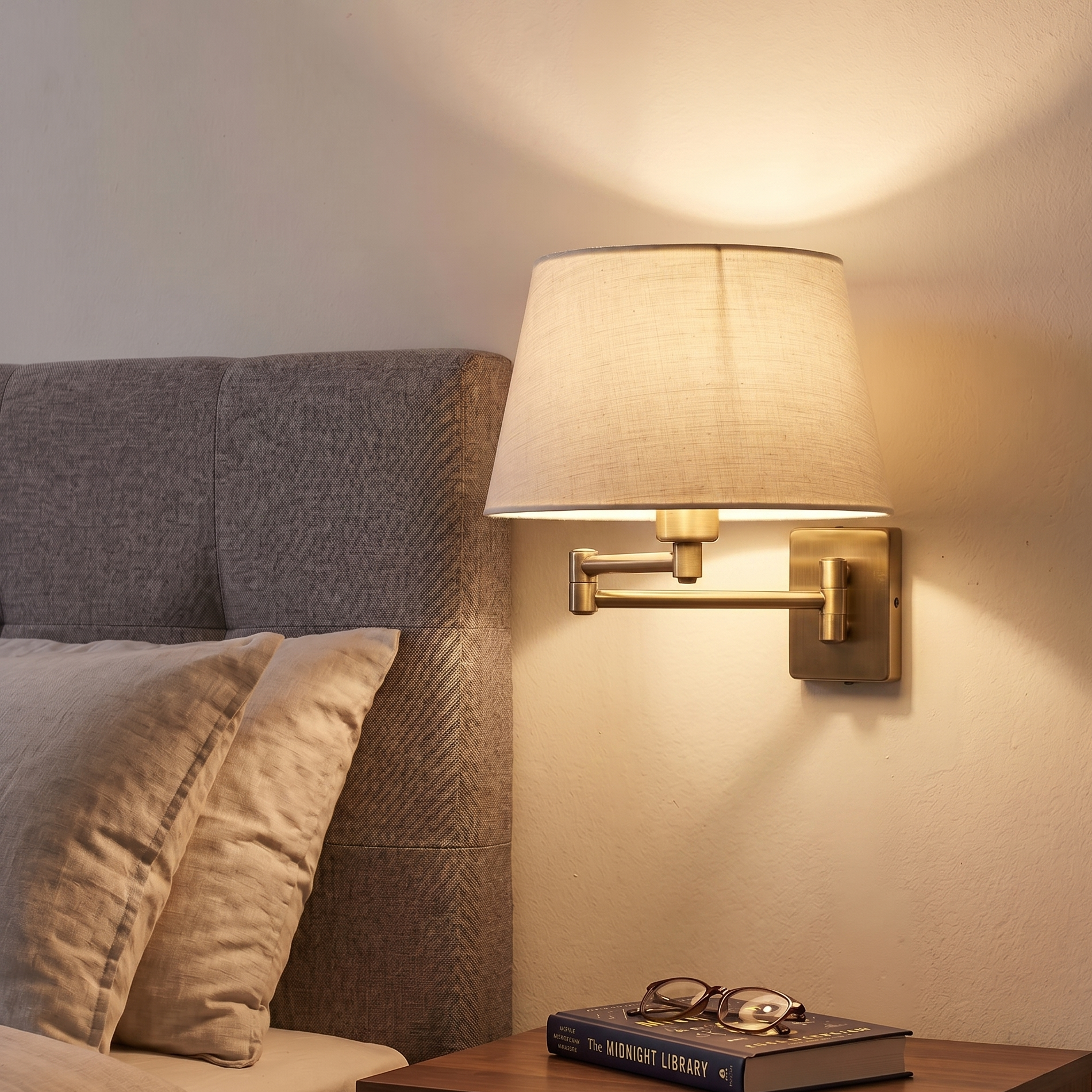 Armada Antique Brass Swing Arm Bedroom Wall Light with Cream Shade