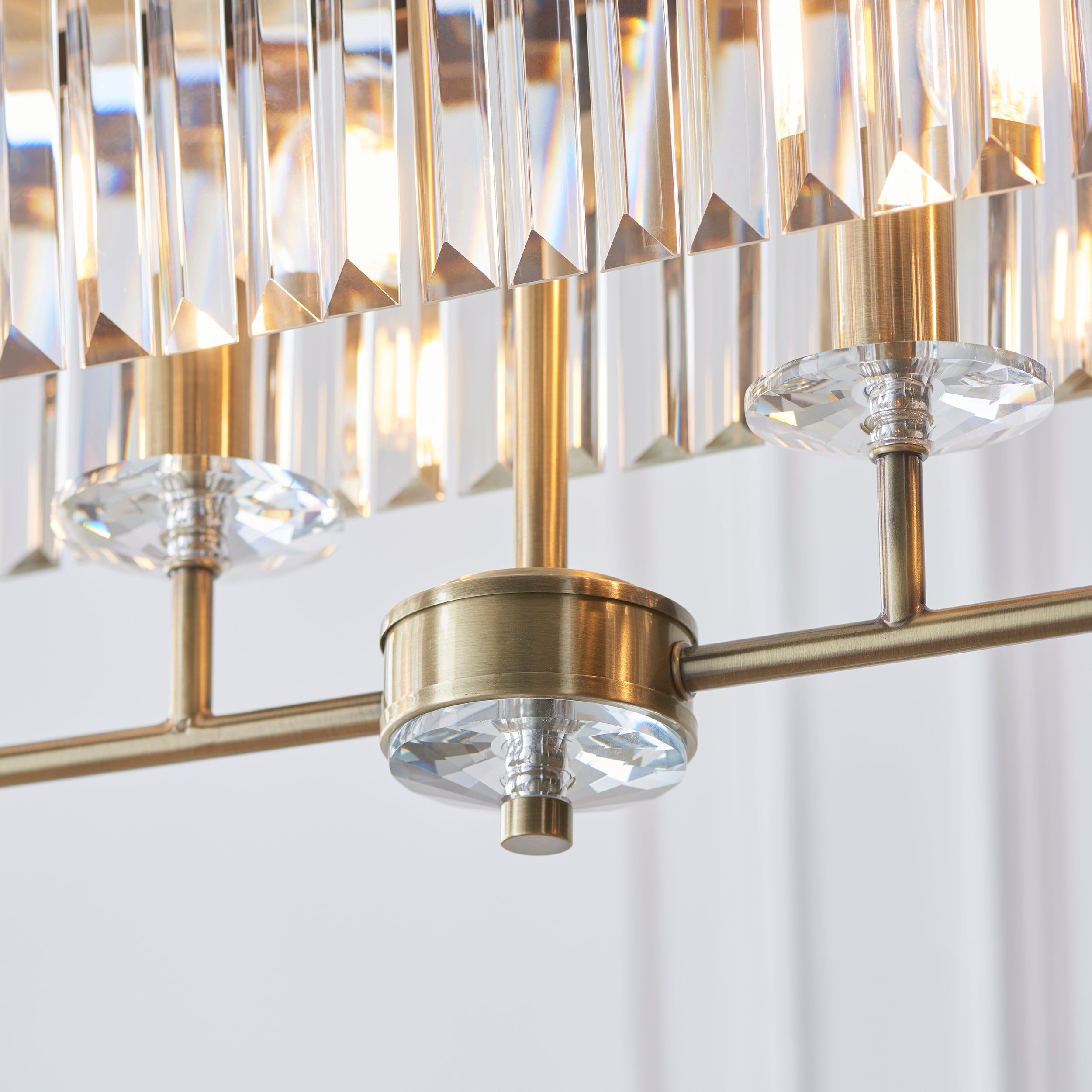 Ealing Brass 4 Light Linear Ceiling Pendant - Cut Faceted Glass