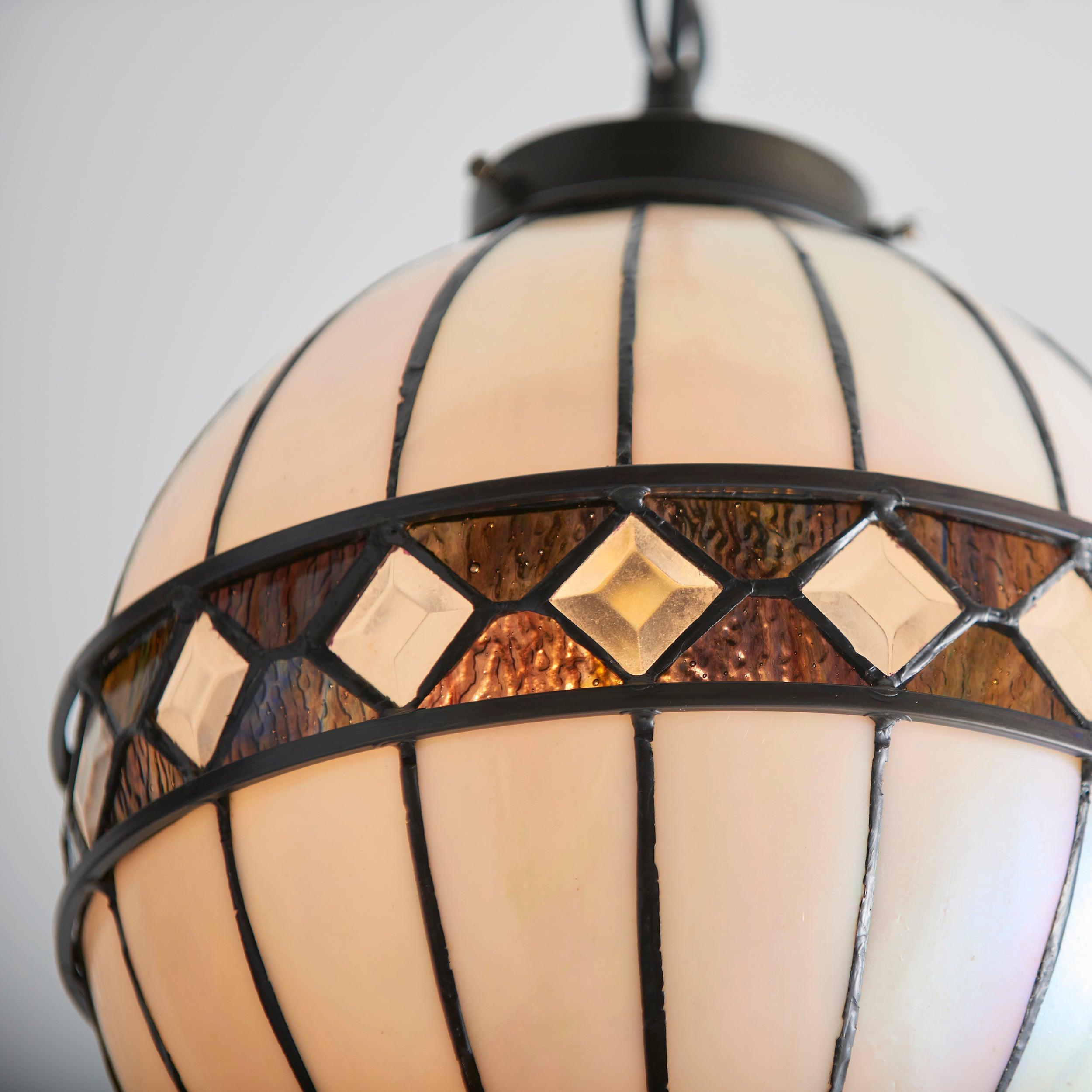 fargo tiffany medium sphere pendant light adjustable chain unlit close up image
