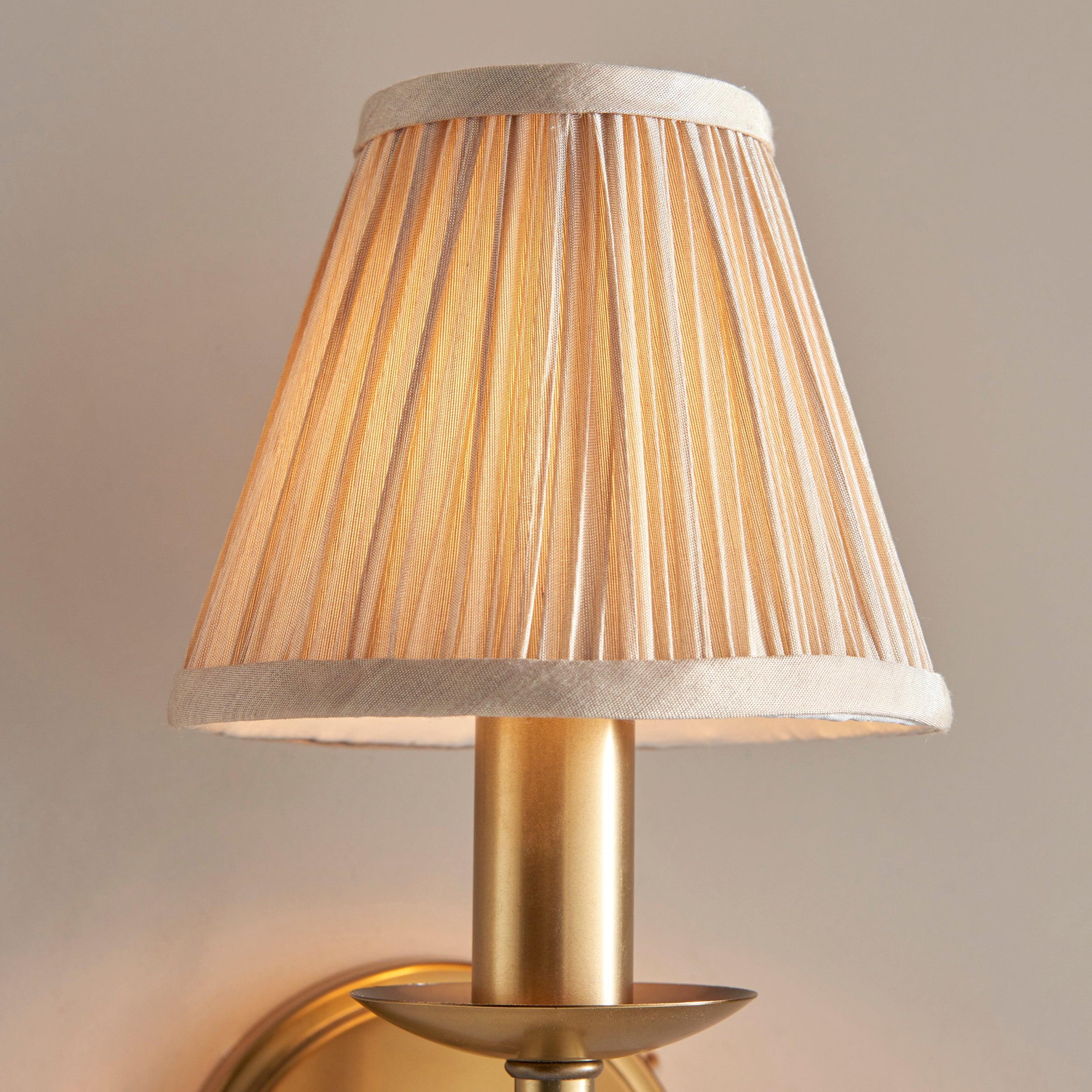 stanford brass single wall light with beige shade