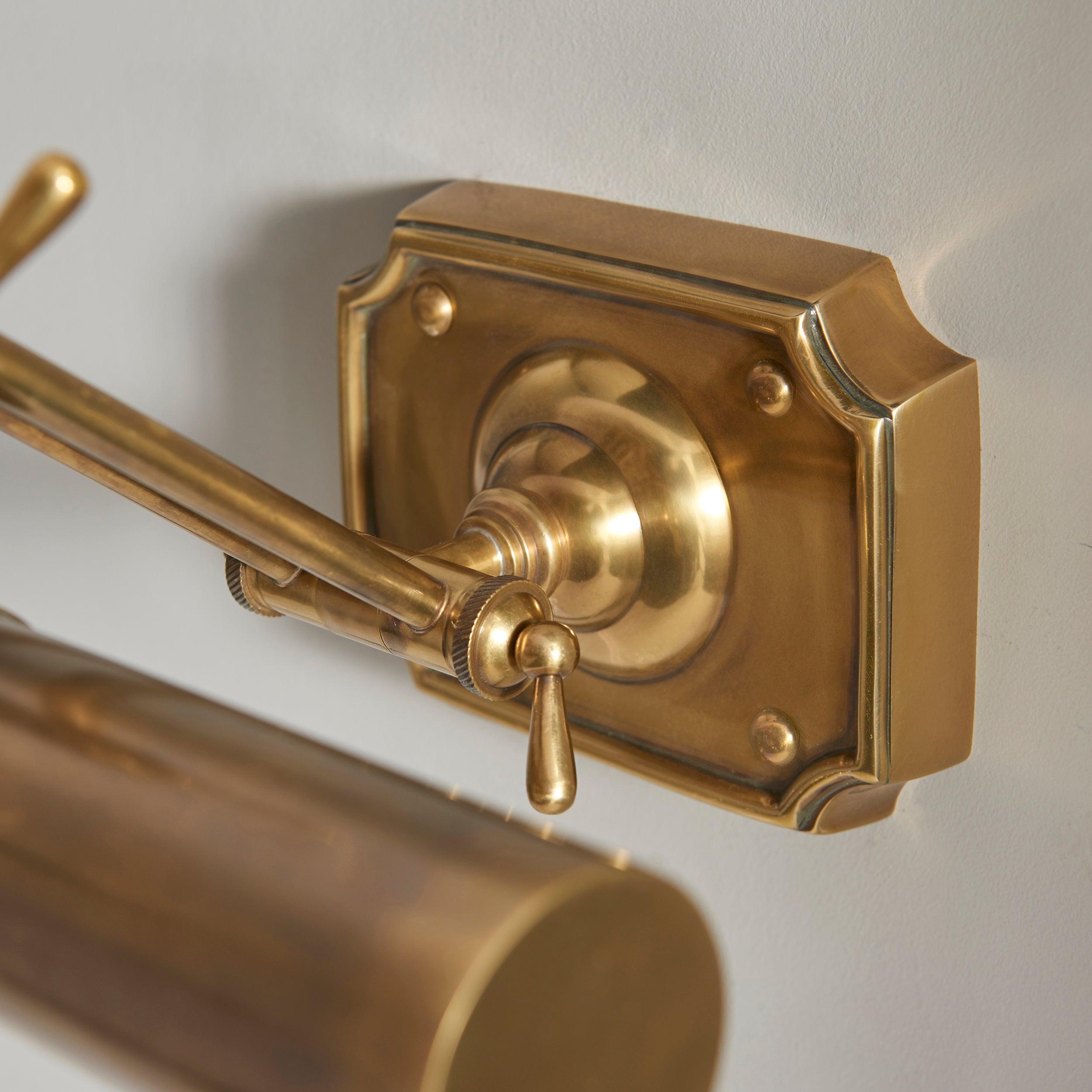 winchester mellow brass medium picture light 69832 Bedroom Lighting lit image