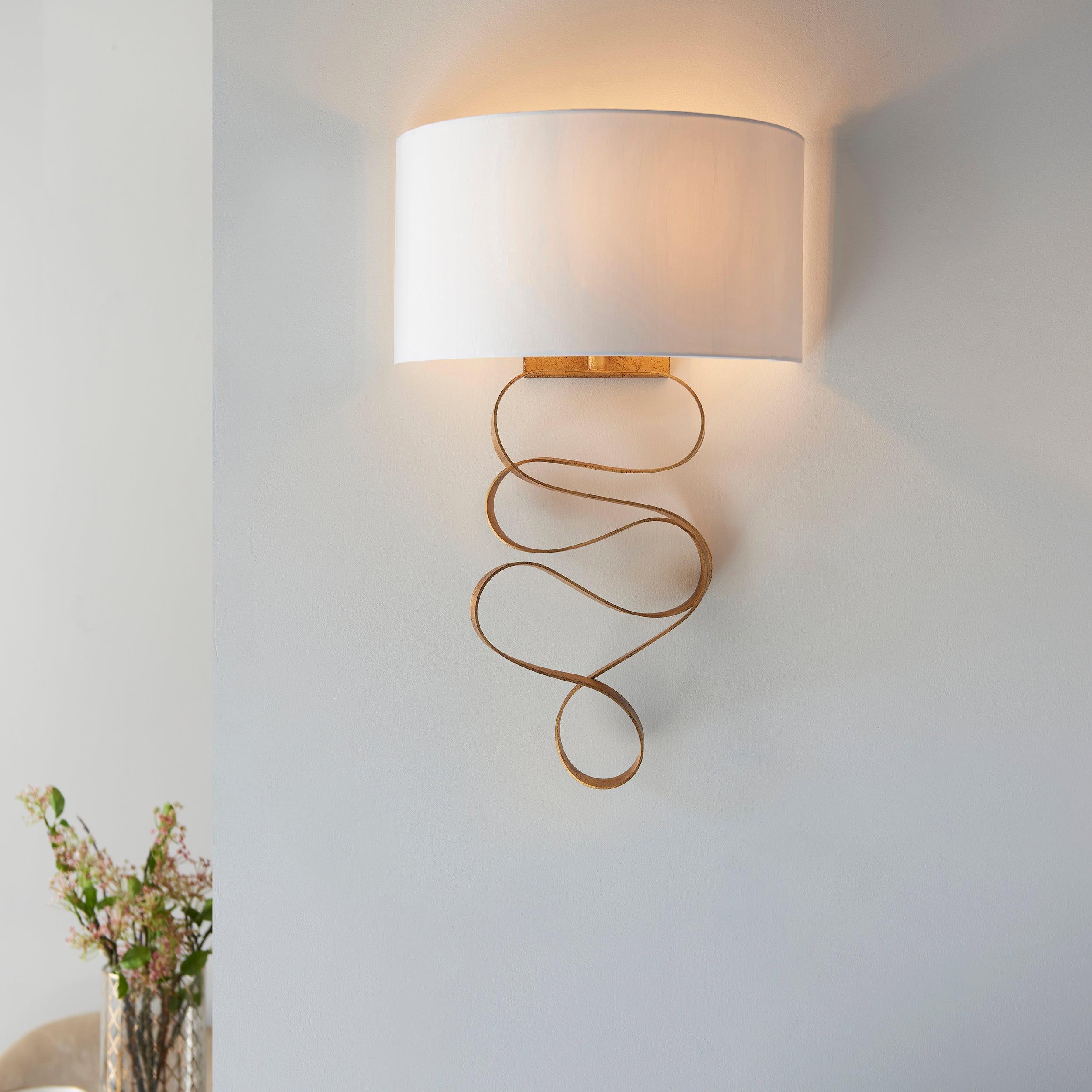 harleston gold modern wall light with ivory shade Living room lighting image