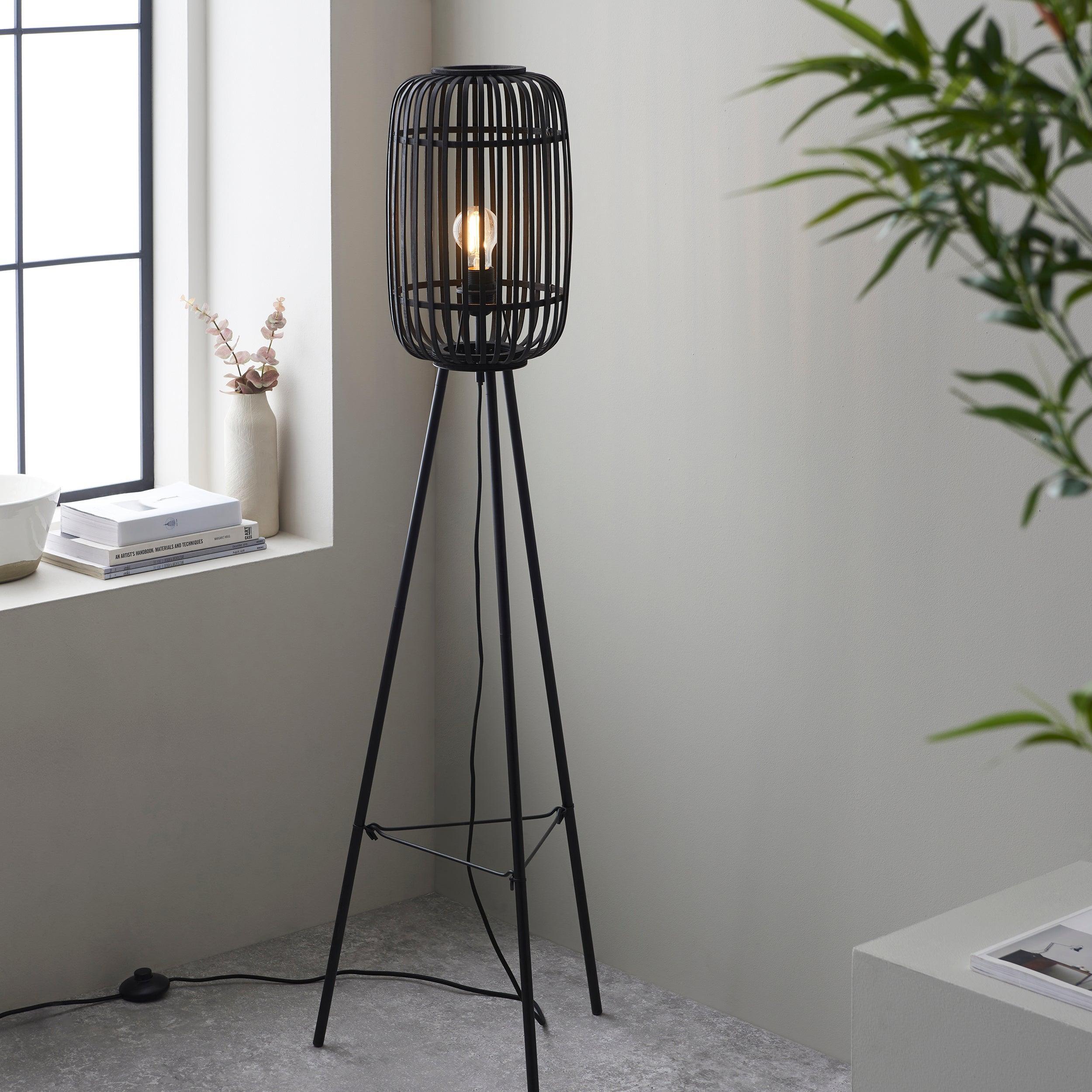 mathias black floor lamp with bamboo shade by Endon Lighting Living Room Family Shot