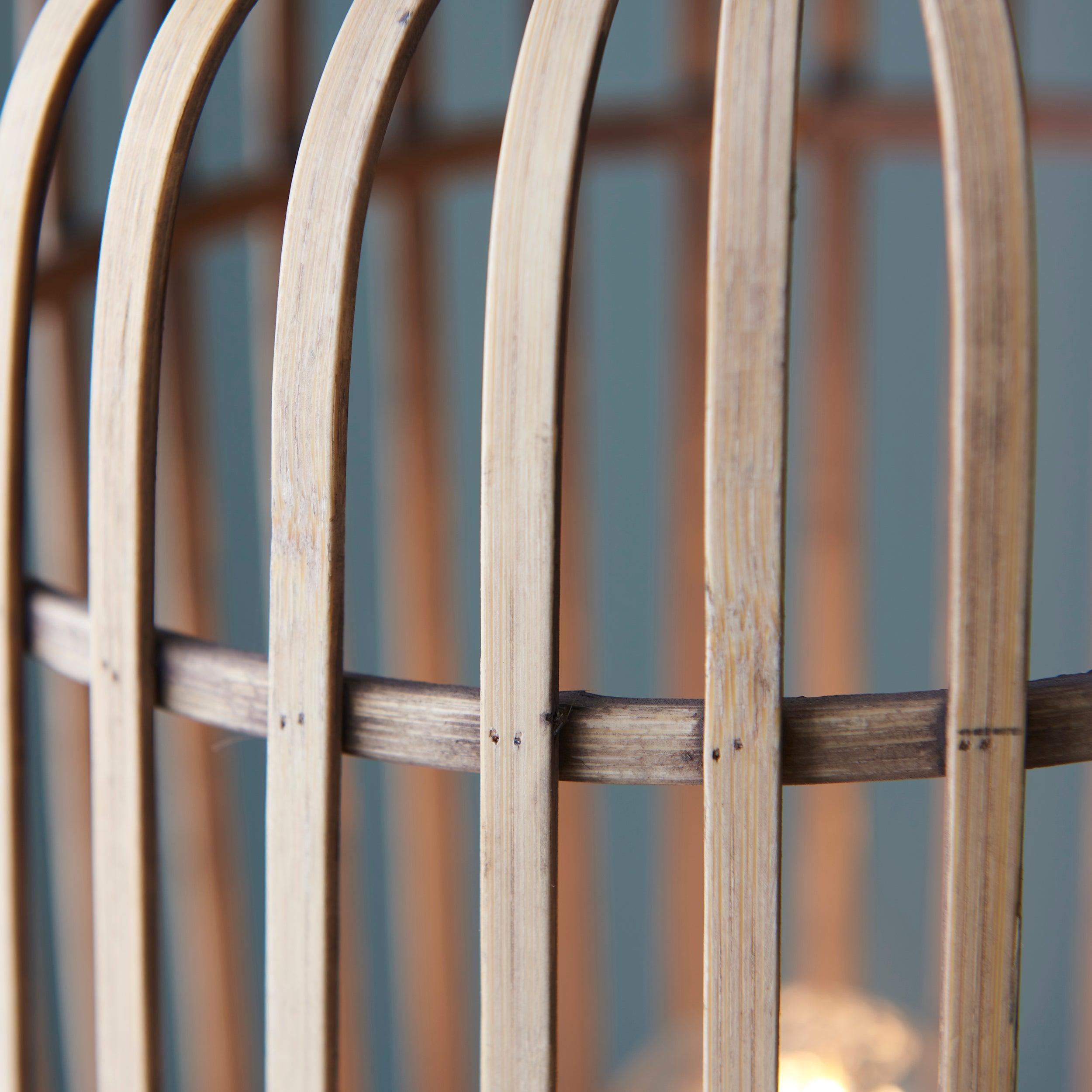 mathias 1 light black floor lamp with bamboo shade by Endon Lighting Bedroom Close Up Image