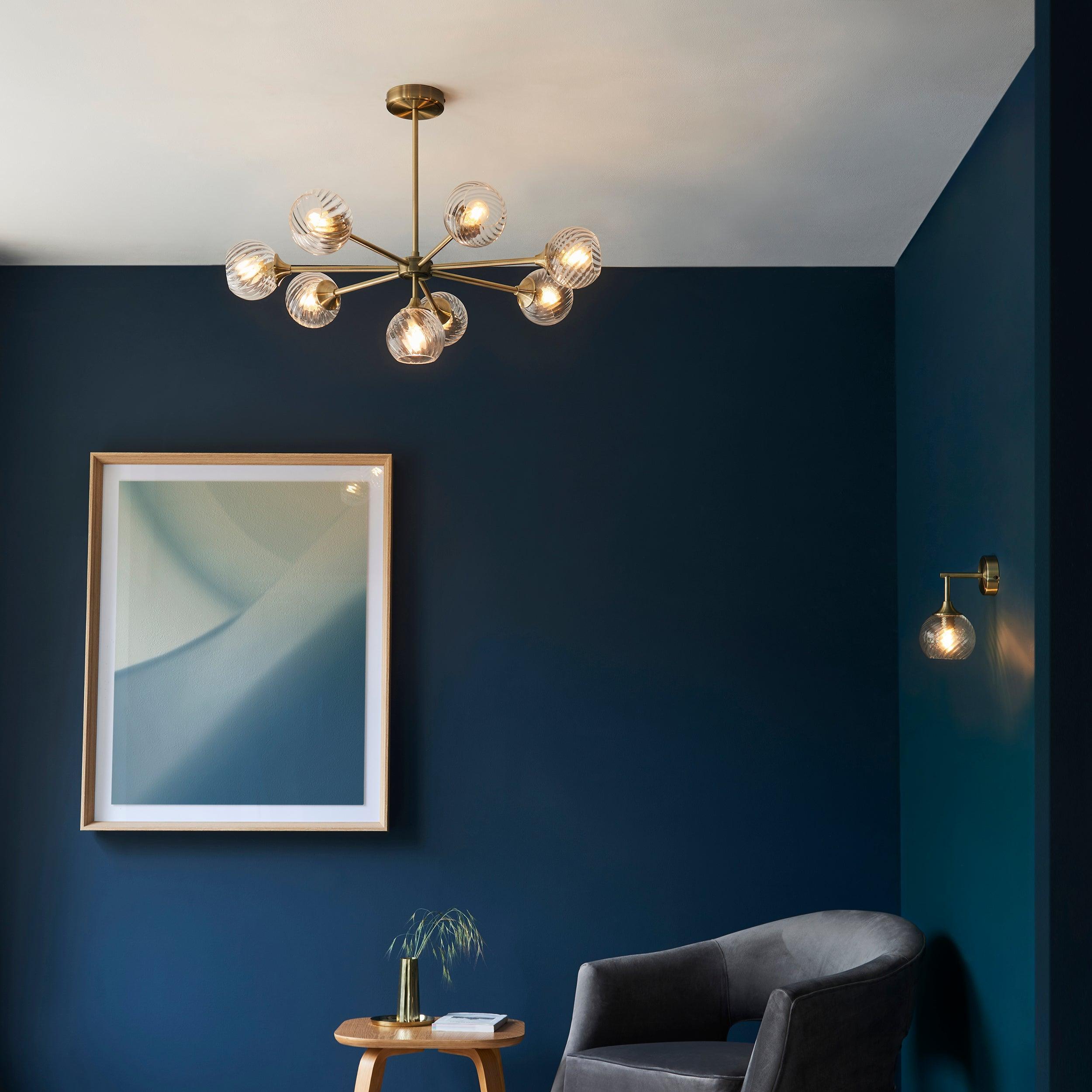 allegra brass wall light glass shade by Endon Lighting Bedroom Close Up Image