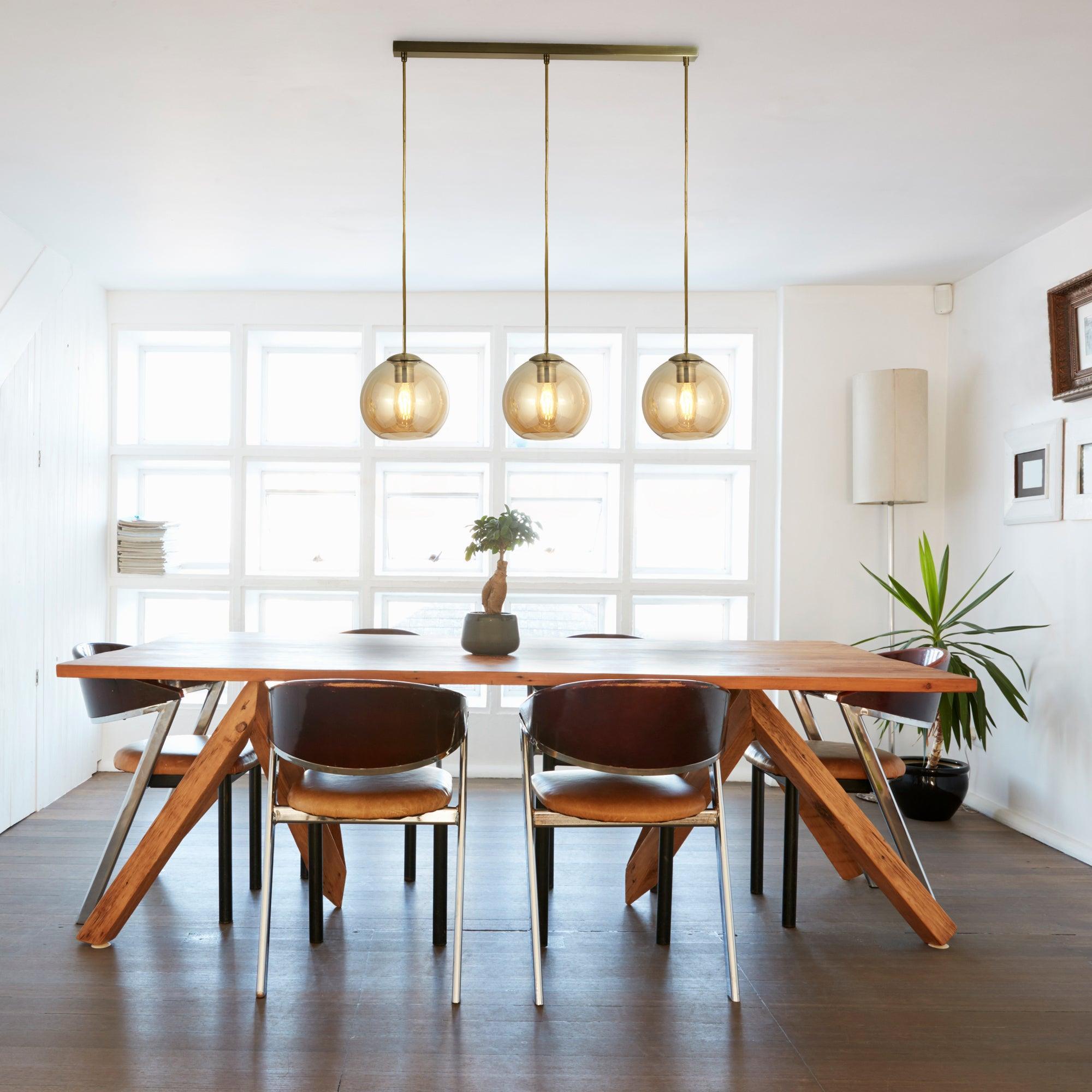 Balls 3 Light Brass Bar Pendant With Amber Glass Shades-Ceiling Pendant Lights-2-Tiffany Lighting Direct