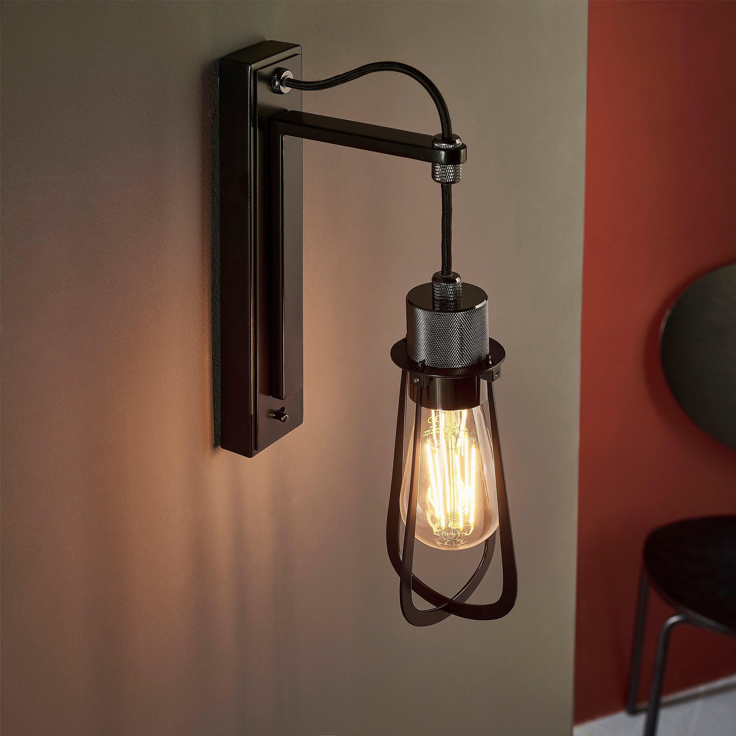 reading black industrial wall light switched Close Up Lit Image