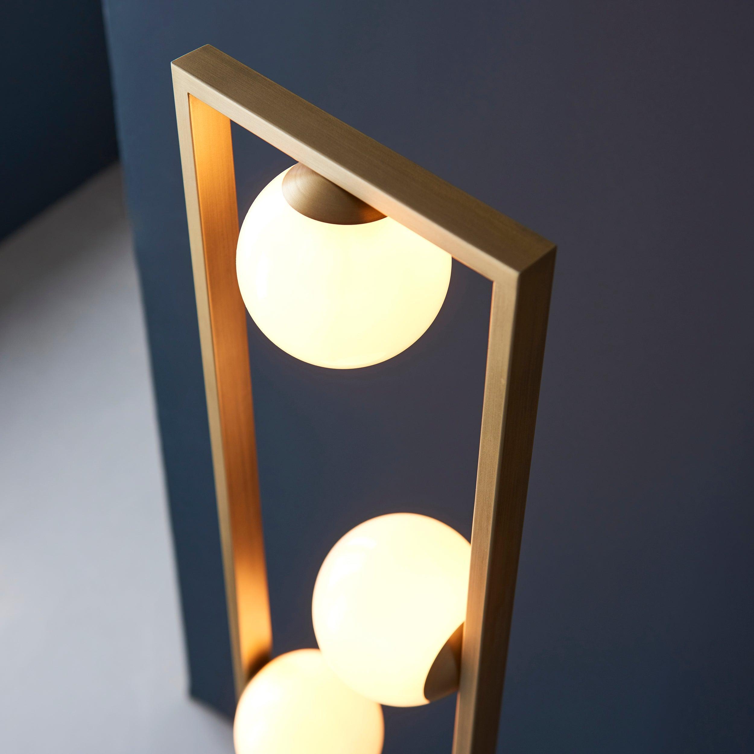 teo gold modern geometric 3 light floor by Endon Lighting Bedroom Close Up Image
