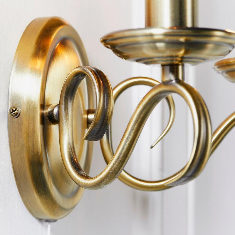 Traditional Wall Lights - Bernice Antique Brass Finish Twin Arm Wall Light 2030-2AN close up fitting on wall