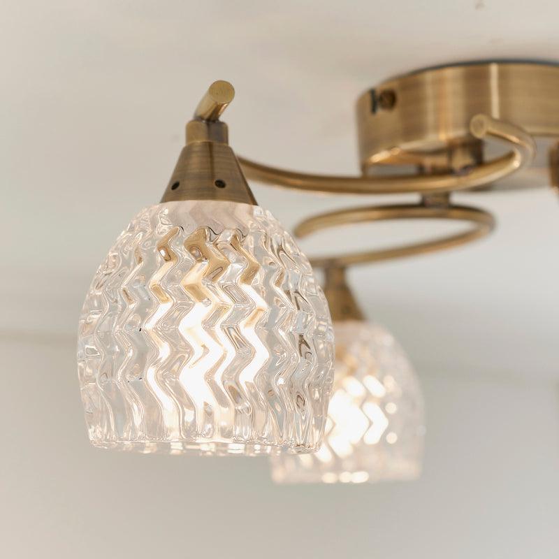 Traditional Flush & Semi Flush Ceiling Lights - Boyer 3 Arm Antique Brass Plate Flush Ceiling Light BOYER-3AB bulb close up