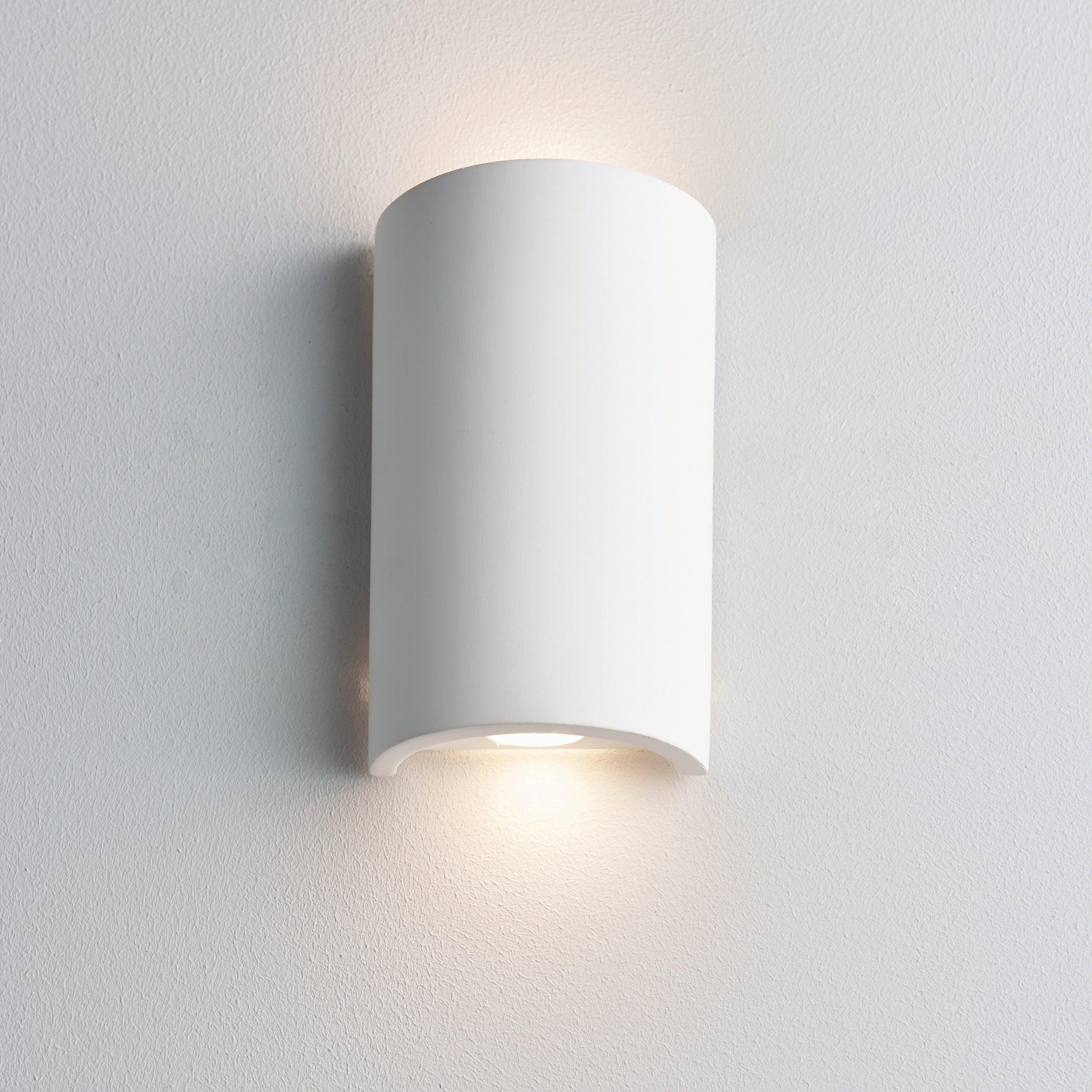crescent white paintable plaster wall light 2 8wby Saxby Lighting, close up image