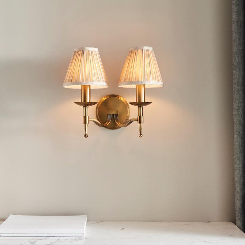 Stanford Antique Brass Double Wall Light - Beige Shades Wide Living Room Image