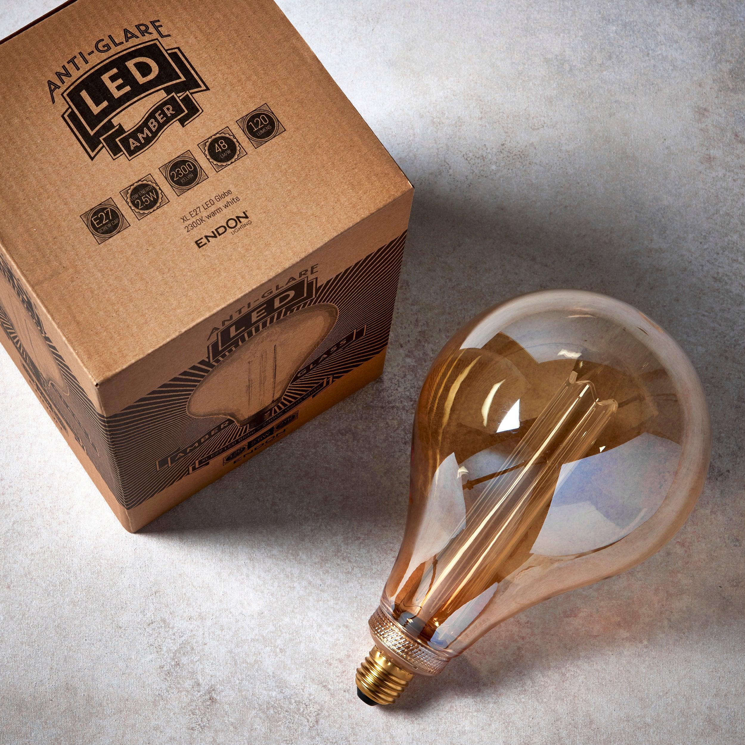 xl dimple e27 amber globe decorative led 2 5w light bulb Close Up Lit Image