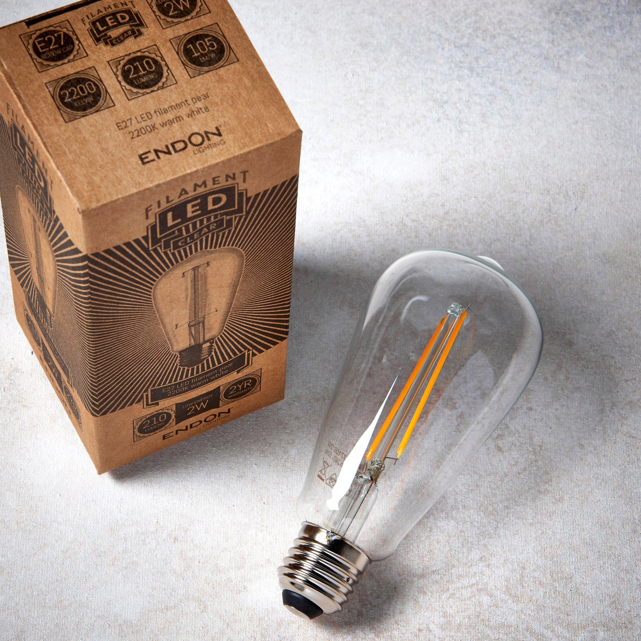 e27 led decorative filament clear pear shaped 2w light bulb Close Up Lit Image