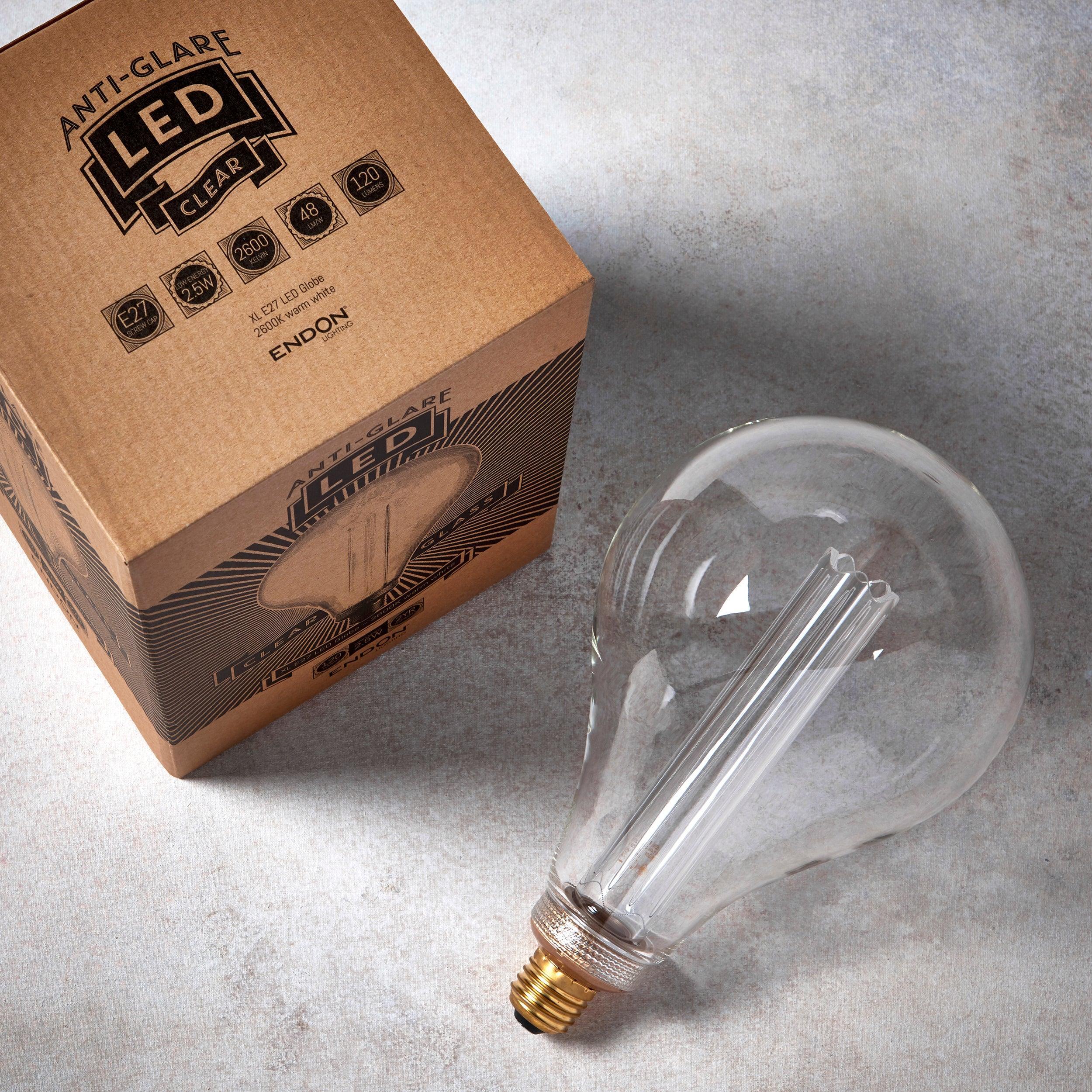 xl dimple e27 clear globe decorative led 2 5w light bulb Close Up Lit Image