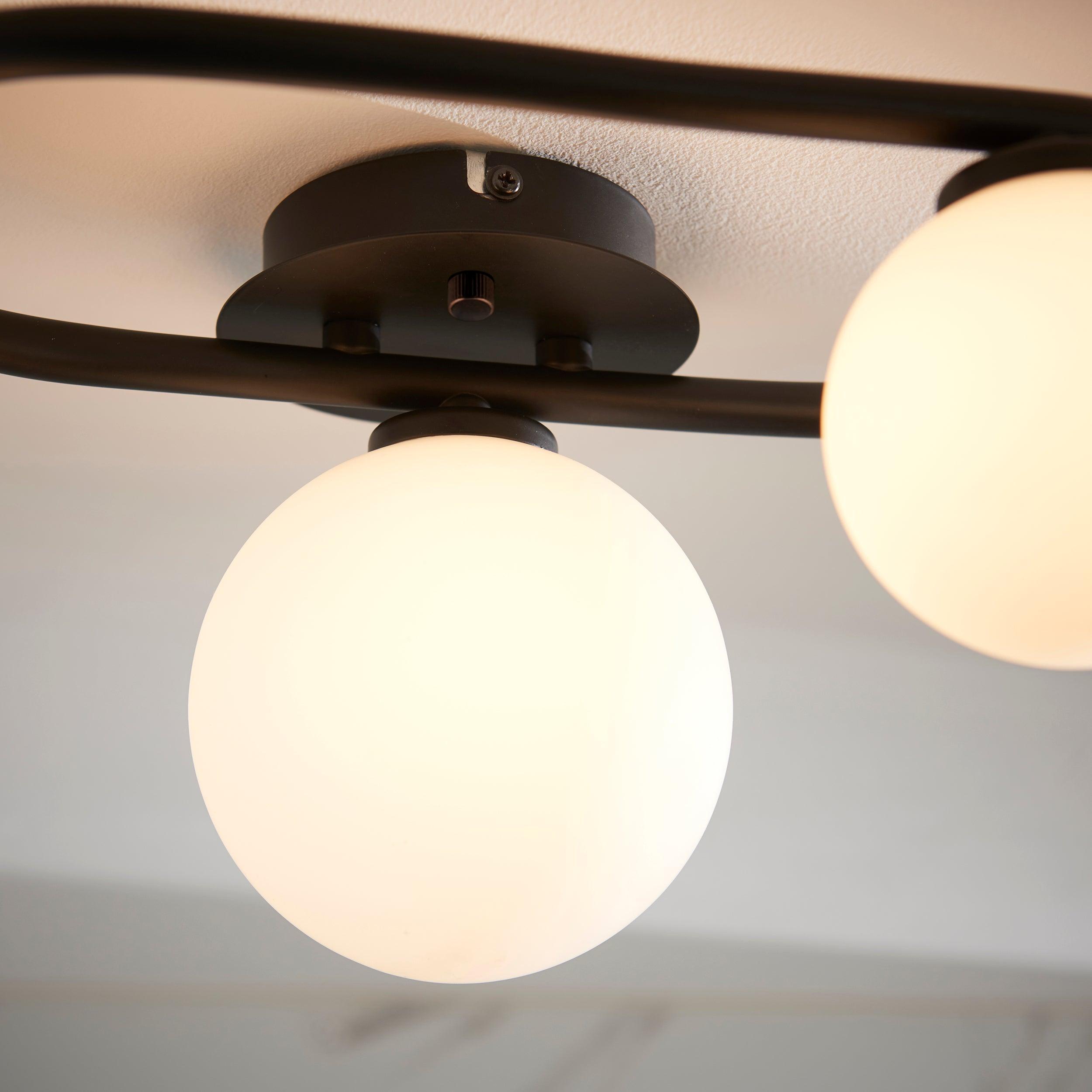 pulsa 3 light black glass semi flush ceiling light by Endon Lighting Bedroom Hero Shot
