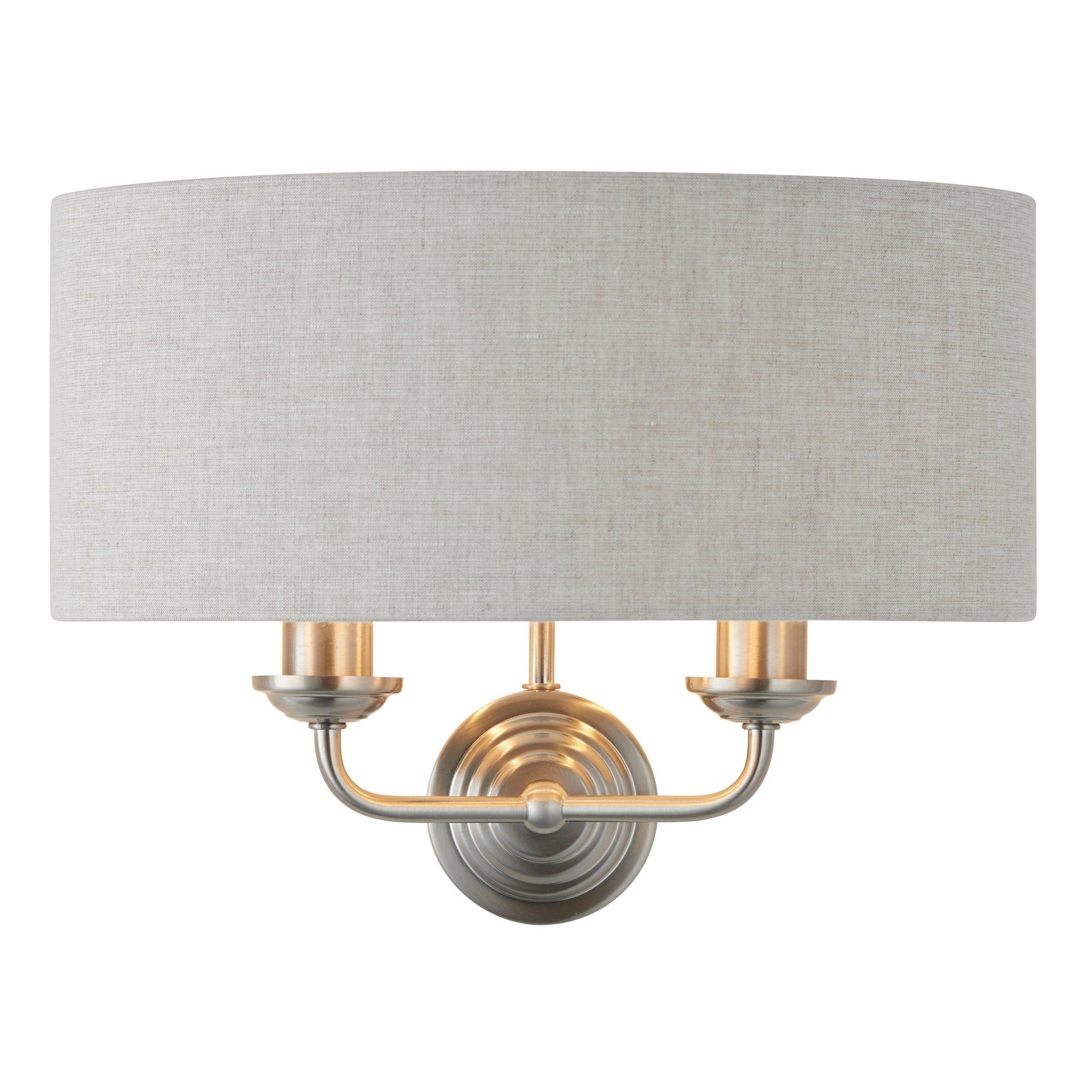highclere brushed chrome wall light natural linen shade by Endon Lighting Living room close up image