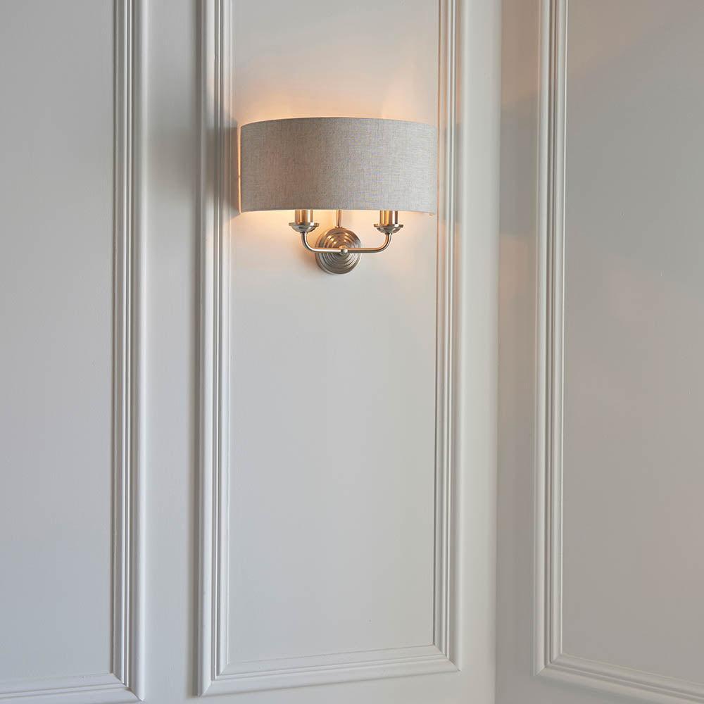 highclere brushed chrome wall light natural linen shade by Endon Lighting Bedroom Hero Shot