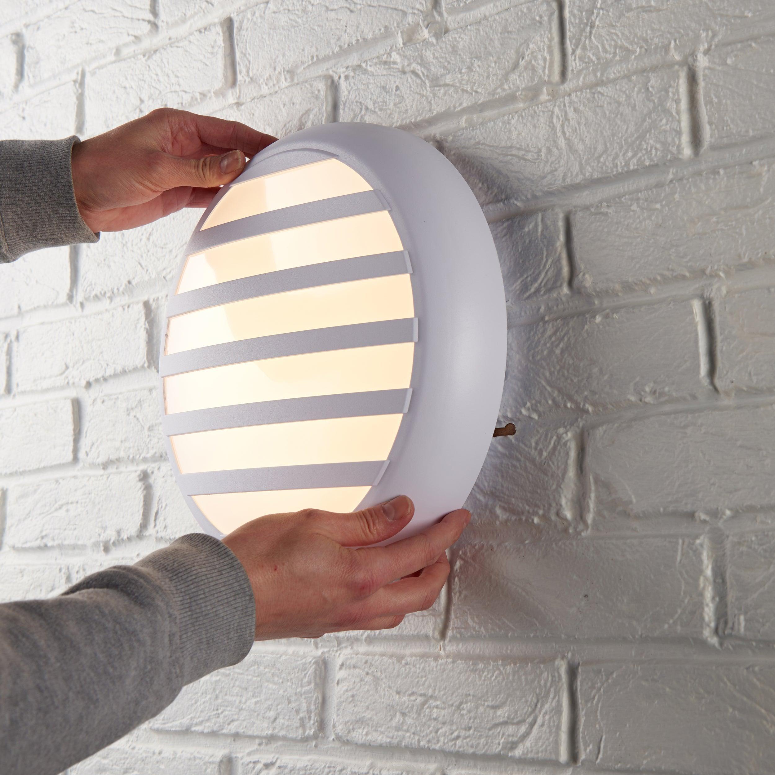 saxby hero white grill bezelby Saxby Lighting, close up image