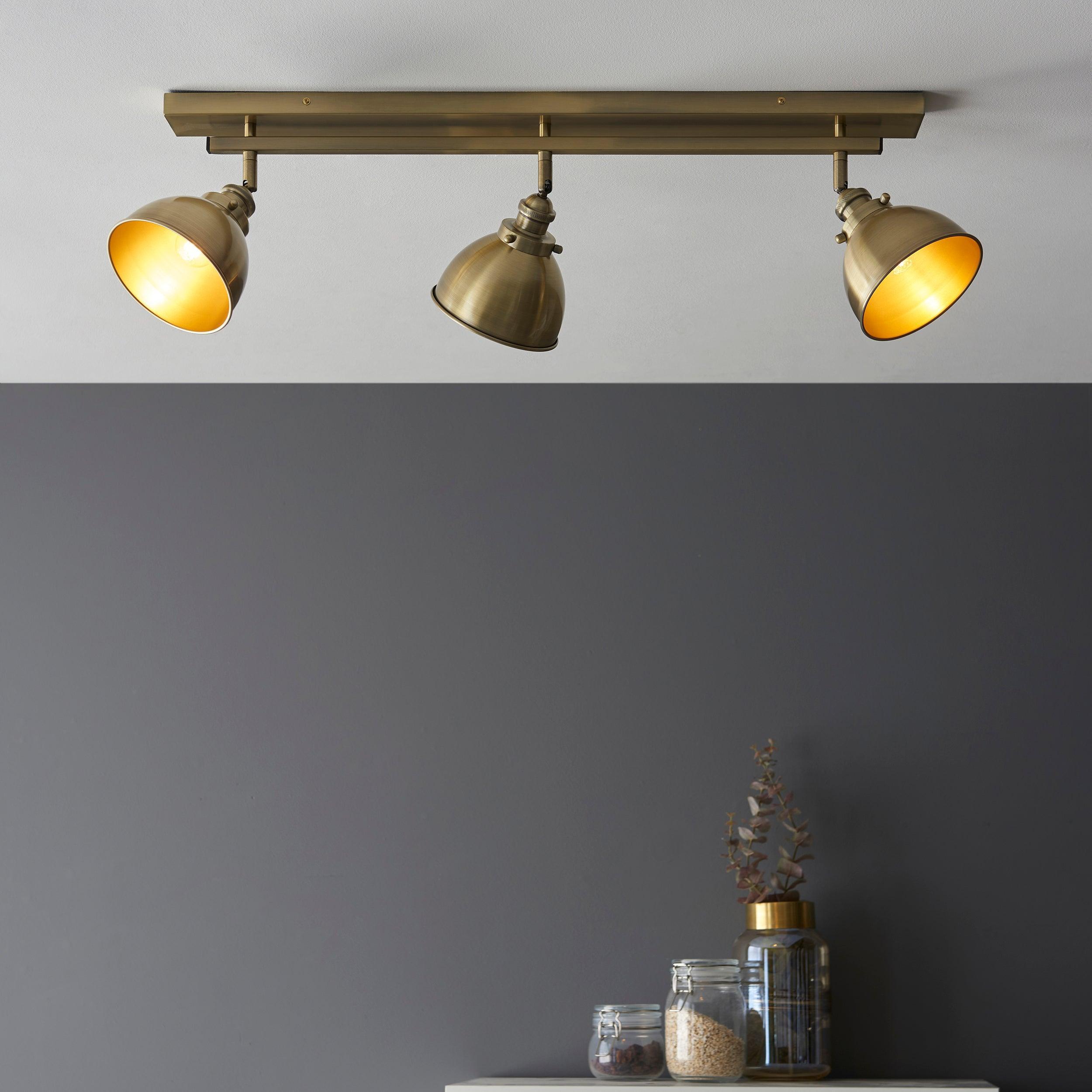wyatt 3 light brass industrial spot light by Endon Lighting Living Room Close Up 82