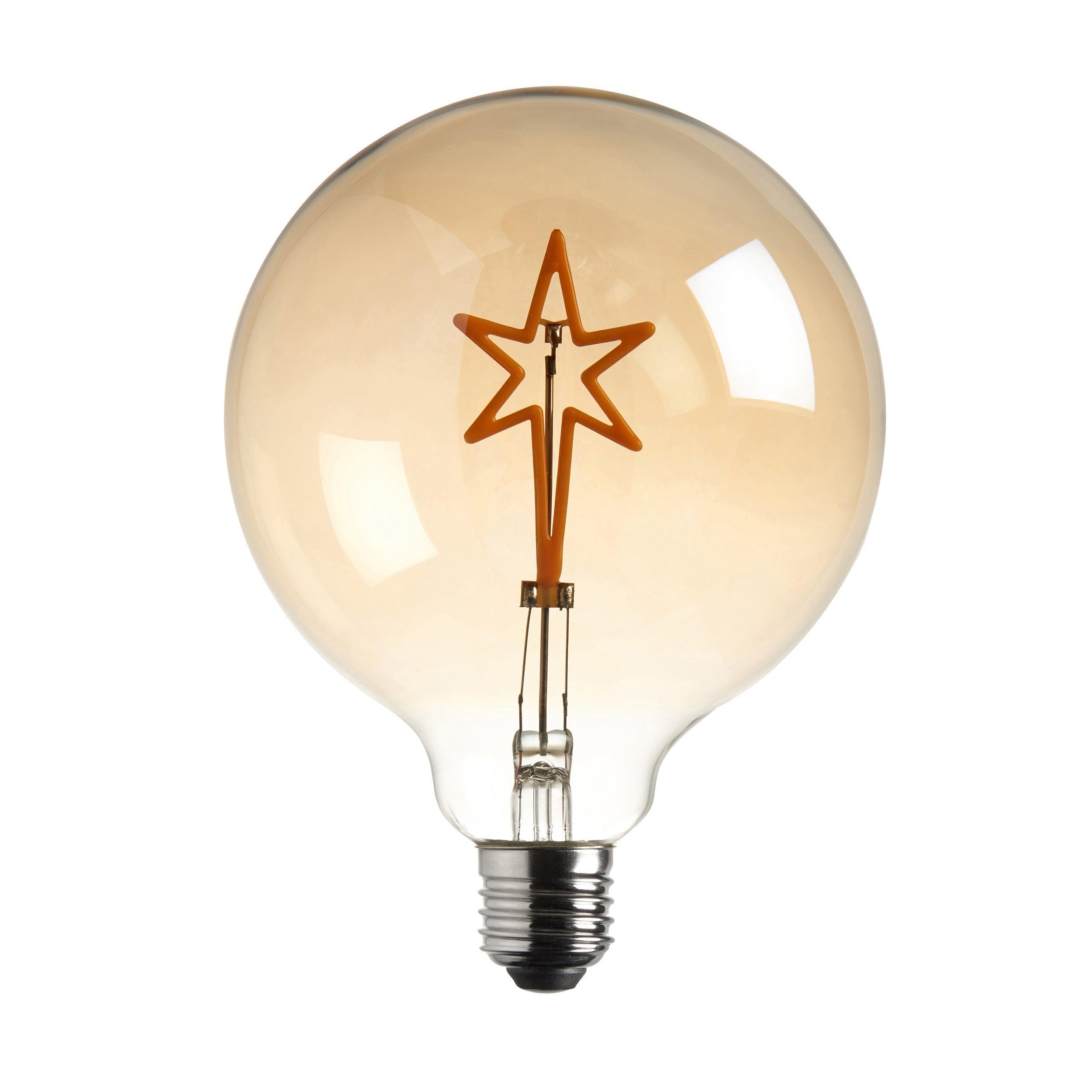 internal star filament amber tinted led 2w e27 light bulb Close Up Lit Image
