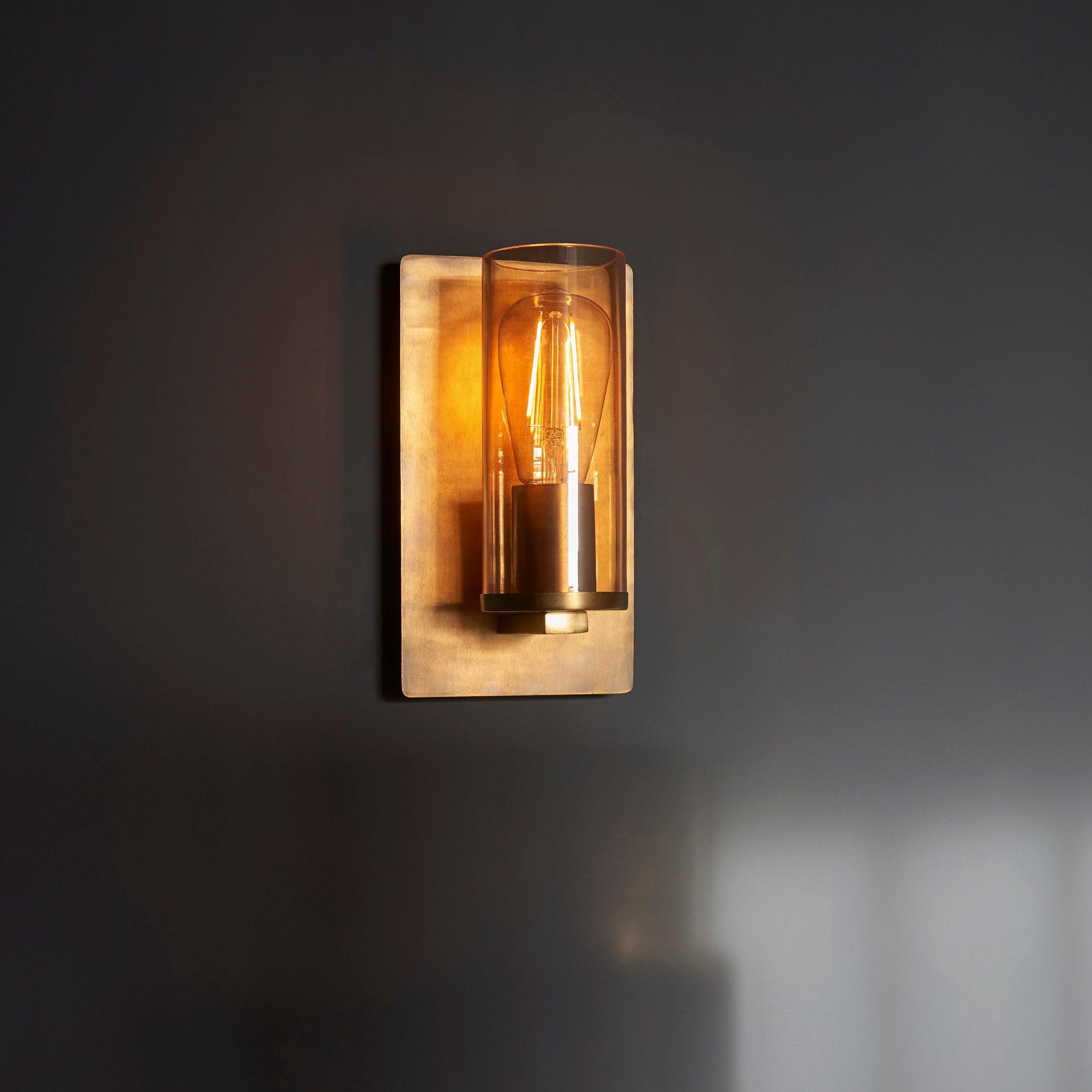 Vauxhall Modern Brass Patina Wall Light with Champagne Glass Close Up Image