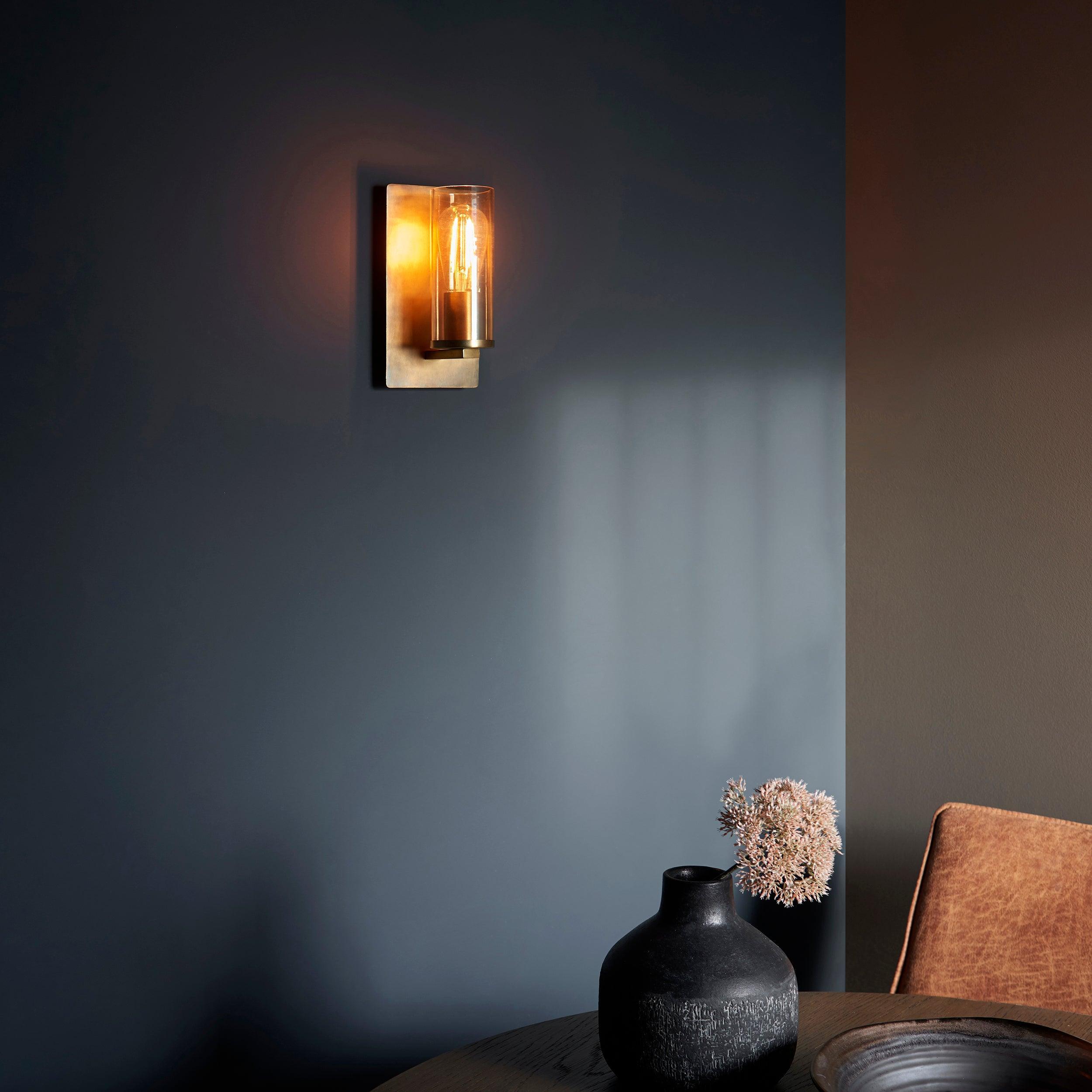 Vauxhall Modern Brass Patina Wall Light with Champagne Glass Living Room Image