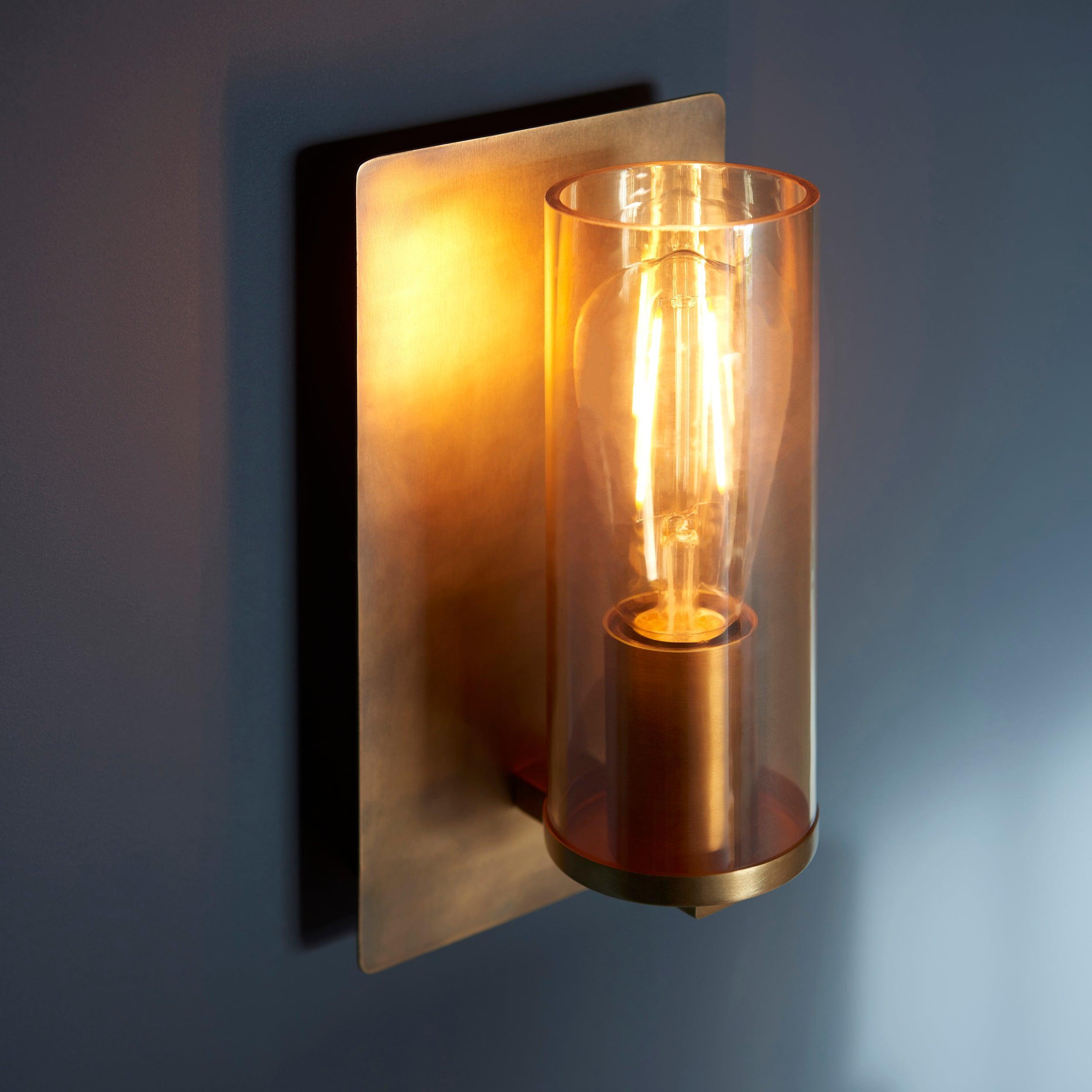 Vauxhall Modern Brass Patina Wall Light with Champagne Glass Living Room Close Up