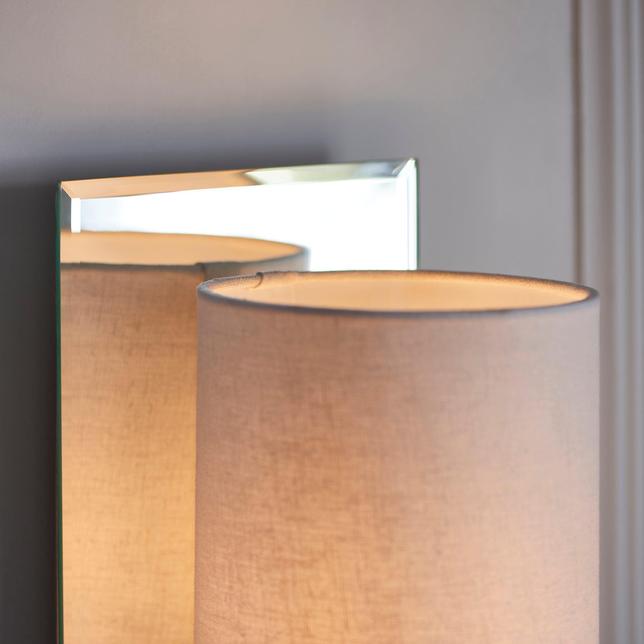 sheena nickel wall light with mirrored glass back Close Up Lit Image