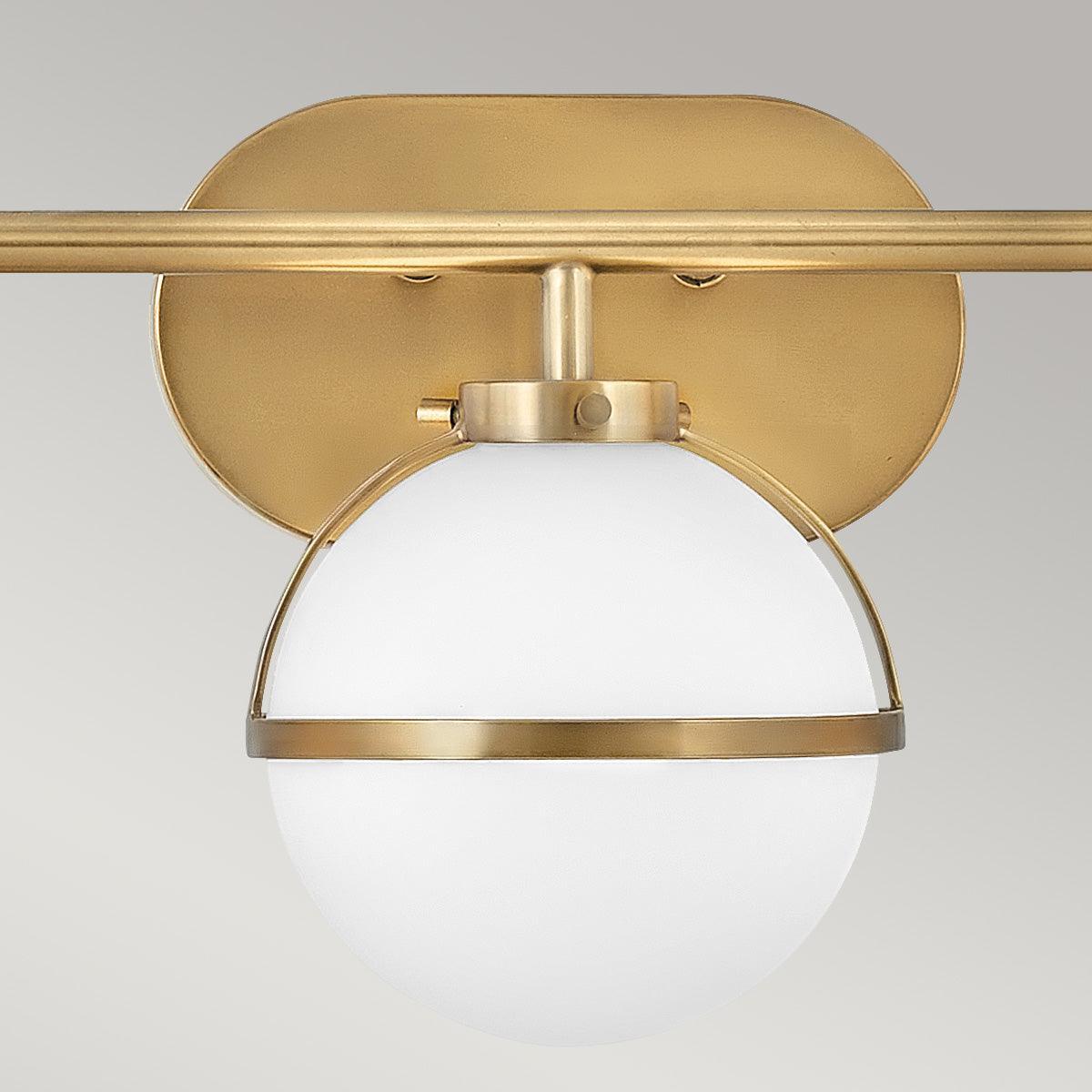 hinkley hollis 3 light brass opal glass bathroom wall light Close Up