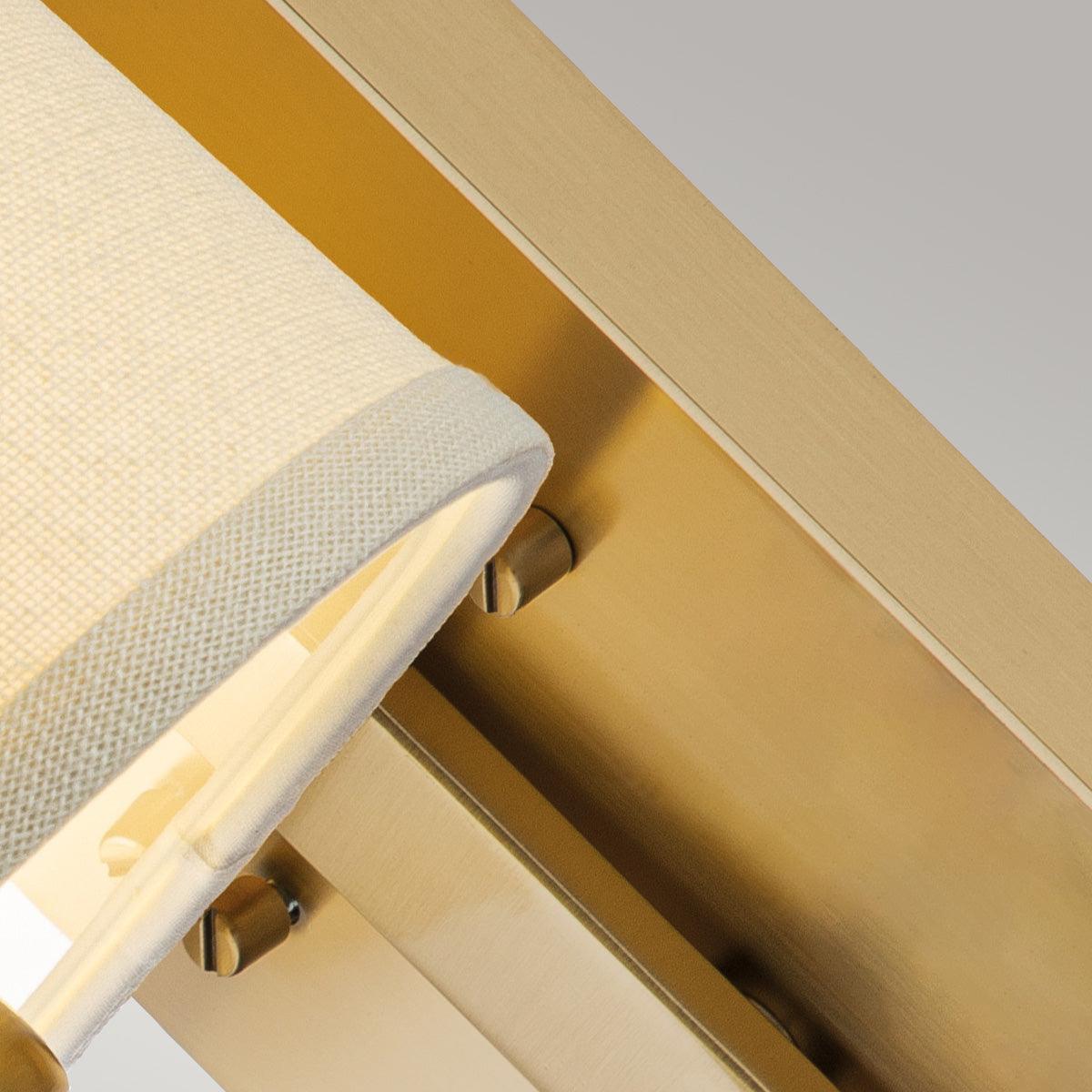 Quoizel Uptown Gotham 1 Light Brass Wall Light - Cream Shade Wide Living Room Image