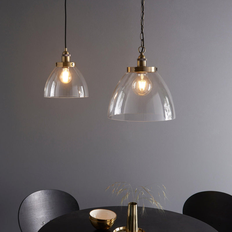 Hansen Grand Brass Pendant Ceiling Light_two lights above a table