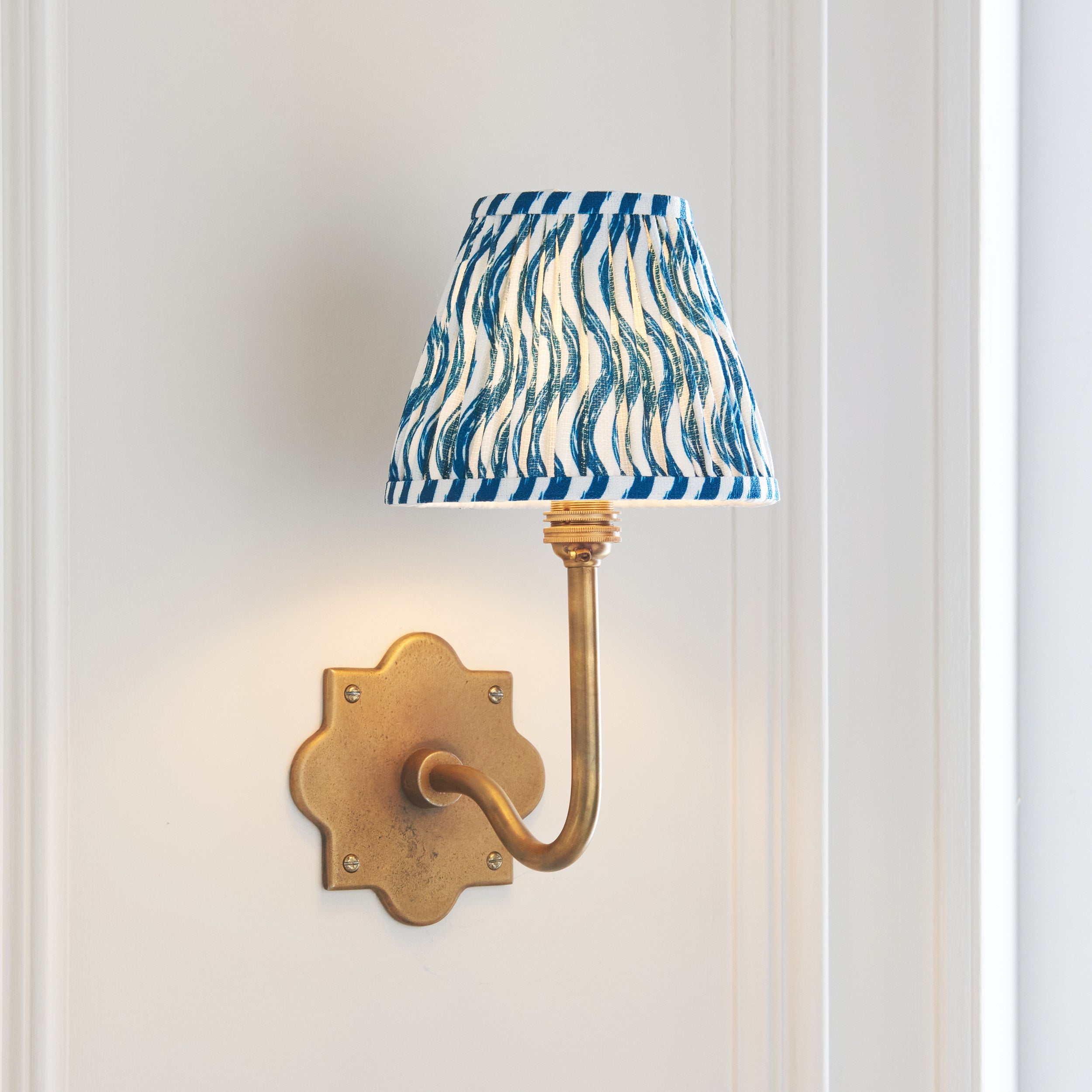 Anvil Swan Antique Brass Wall Light & Ripple 16cm Blue Shade