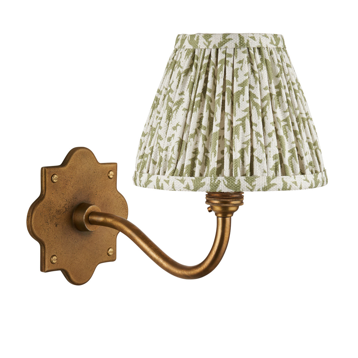 Anvil Curve antique brass wall light with green foliage pleated shade, plain white product shot