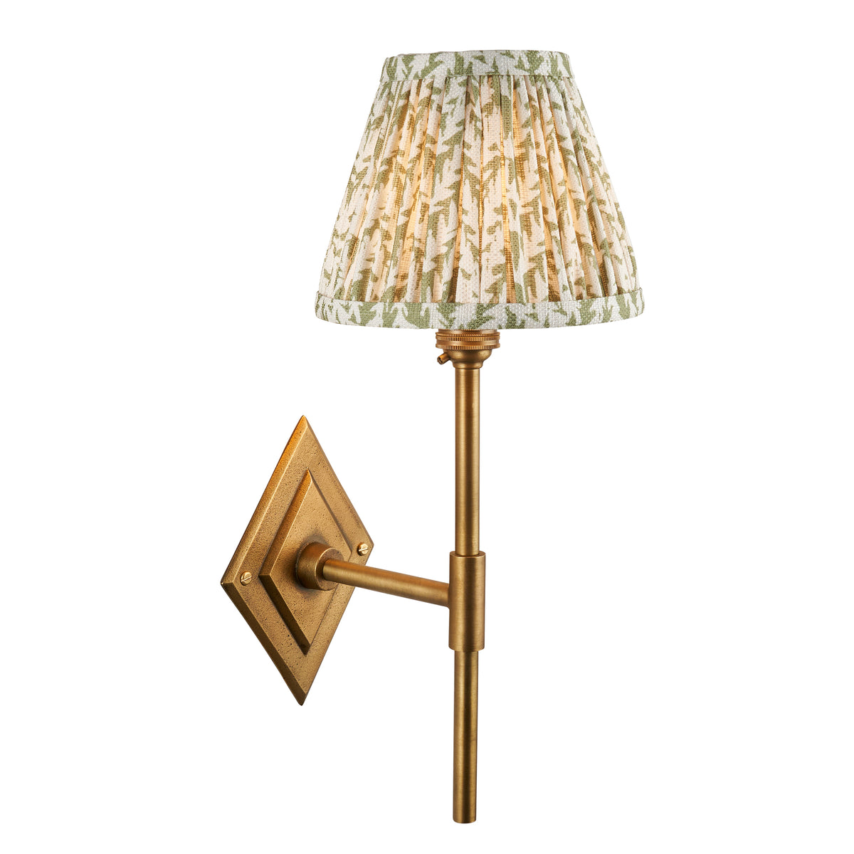 Diamond Tall antique brass wall light with green leaf-print pleated shade on a diamond backplate