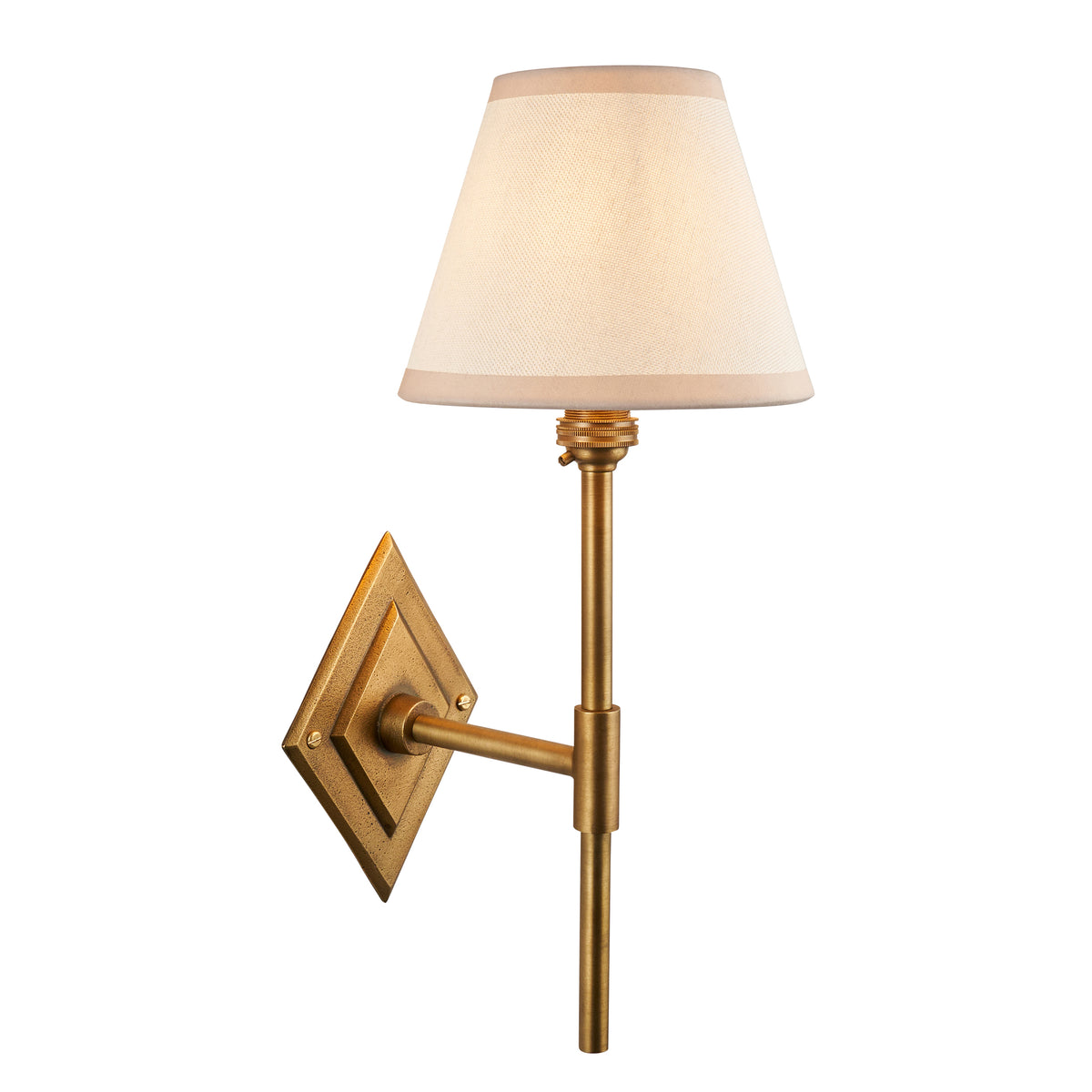 Diamond Tall antique brass wall light with plain white fabric empire shade on a diamond backplate