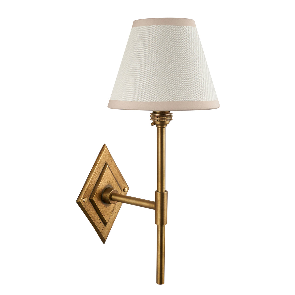 Diamond Tall antique brass wall light with white fabric shade, cut out on a white background