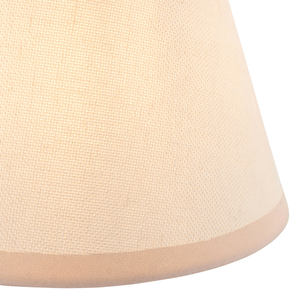 Close-up of the cream linen shade fabric showing woven texture and neat bound lower edge
