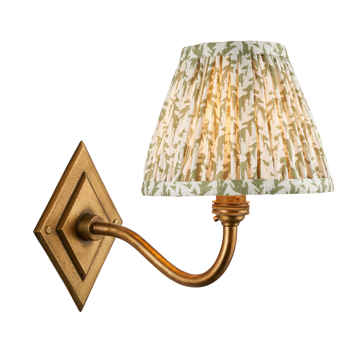 Diamond Curve antique brass wall light with a pleated green leaf print shade on a diamond backplate