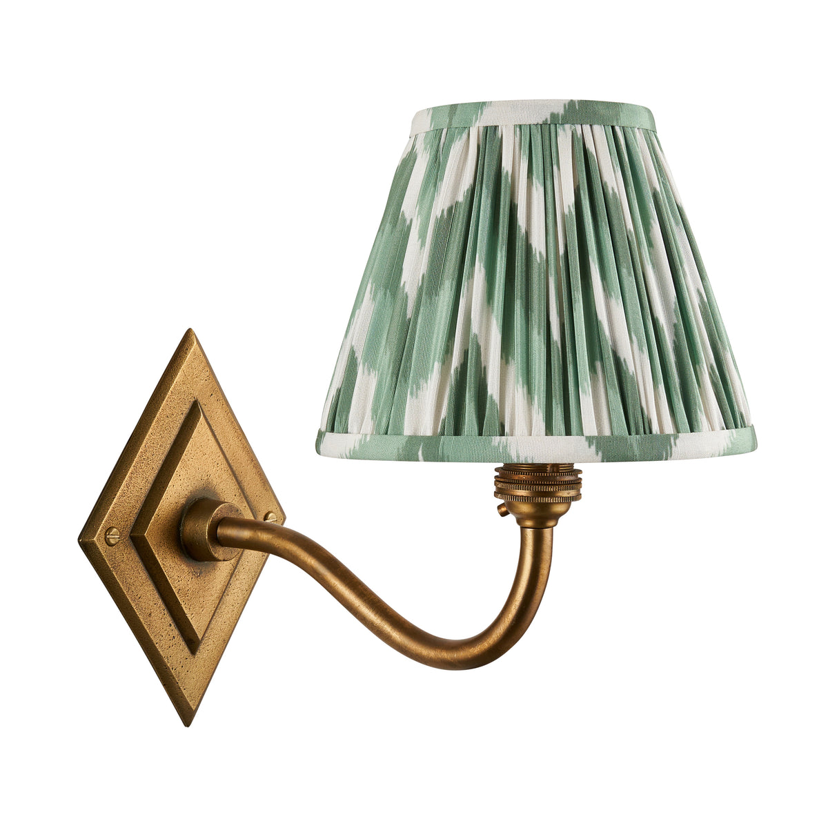 Diamond Curve antique brass wall light with green zigzag pleated shade on a white background