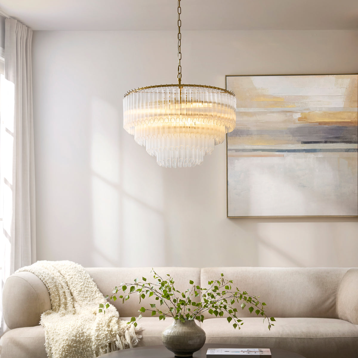 Large Montpellier aged brass chandelier with layered clear ribbed glass rod tiers